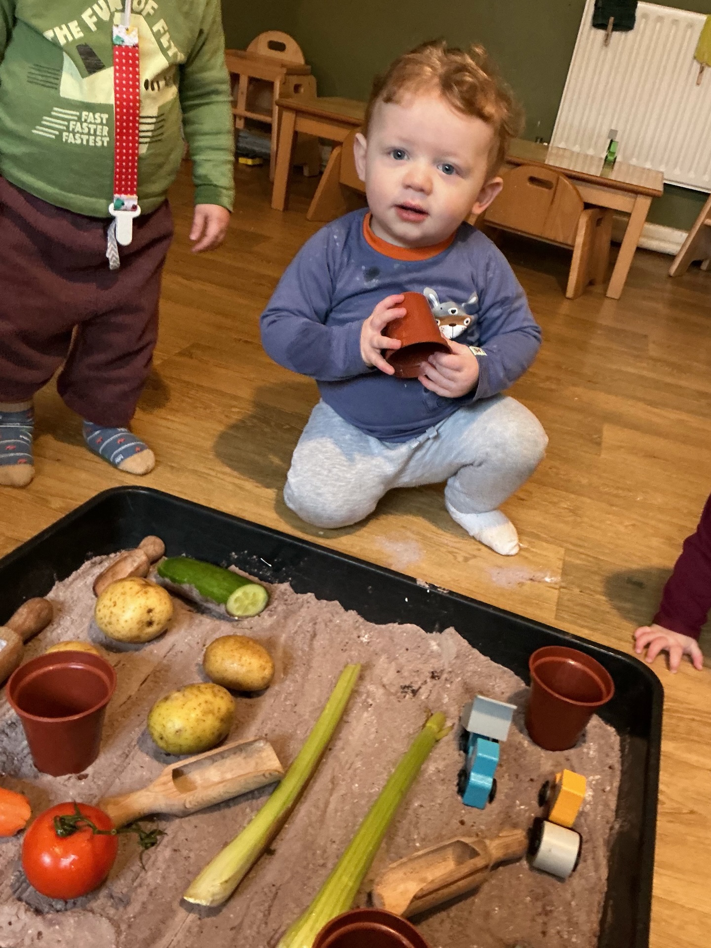This month our Wanderlust theme is “In the Ground” 🌱
Our babies have been busy digging up hidden vegetables and giving them a good scrub! From muddy potatoes to bubbly washing fun, this activity sparked curiosity, sensory play, and lots of smiles. They even had a splash around in the water tray afterwards!
Learning where our food comes from has never been so fun (or so messy!) 🥔🧼
#WanderlustLearning #InTheGround #Hygge #SensoryPlay #LearningThroughPlay NurseryLife