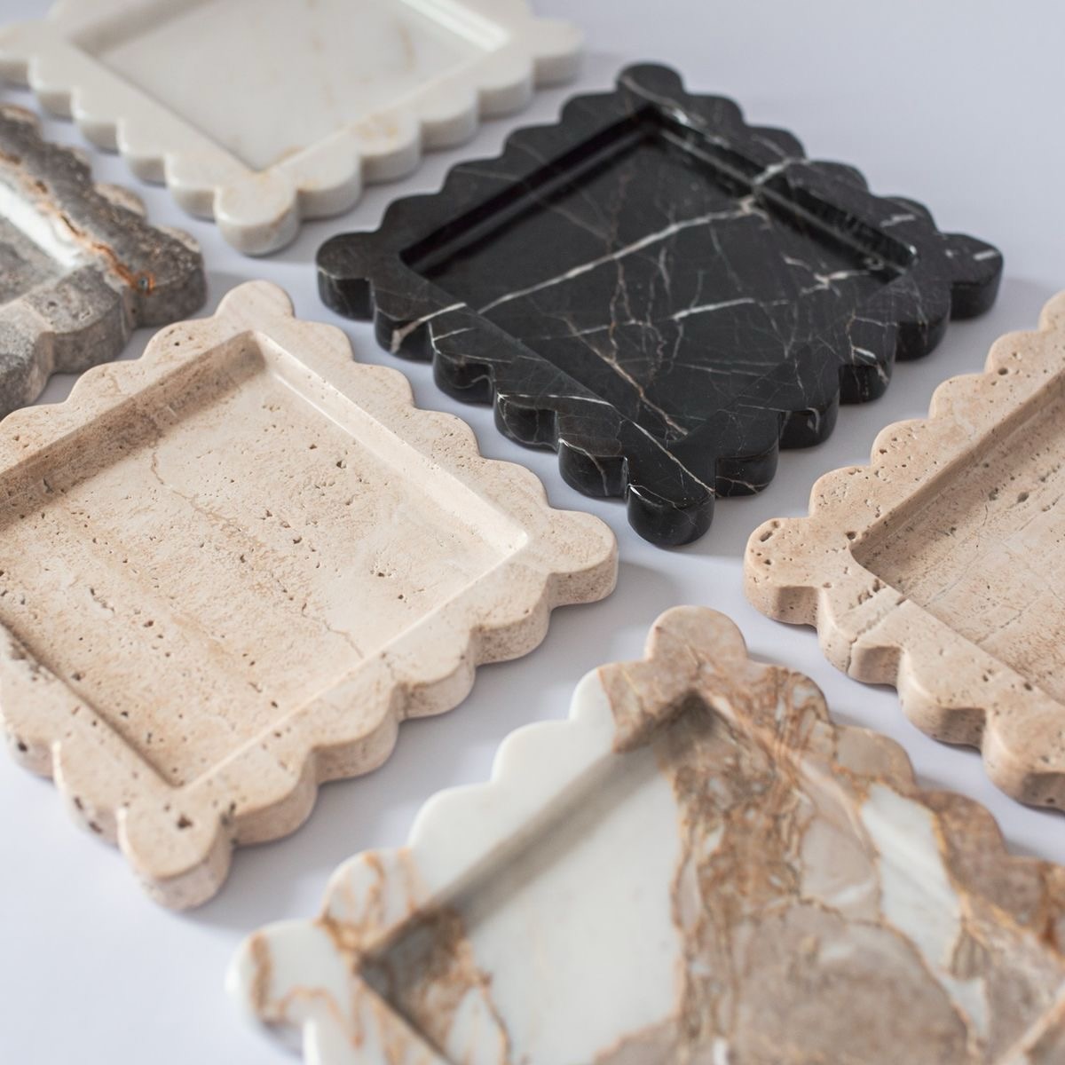 Our Frilly Range has officially arrived.
Precision meets nature with these waterjet-cut stone trays. From deep Nero Marquina to earthy Travertine, each piece is designed with an organic, scalloped finish that turns your everyday essentials into a curated display.
#nuacollective #marbledesign #frillyrange #organicshapes #homedecor
