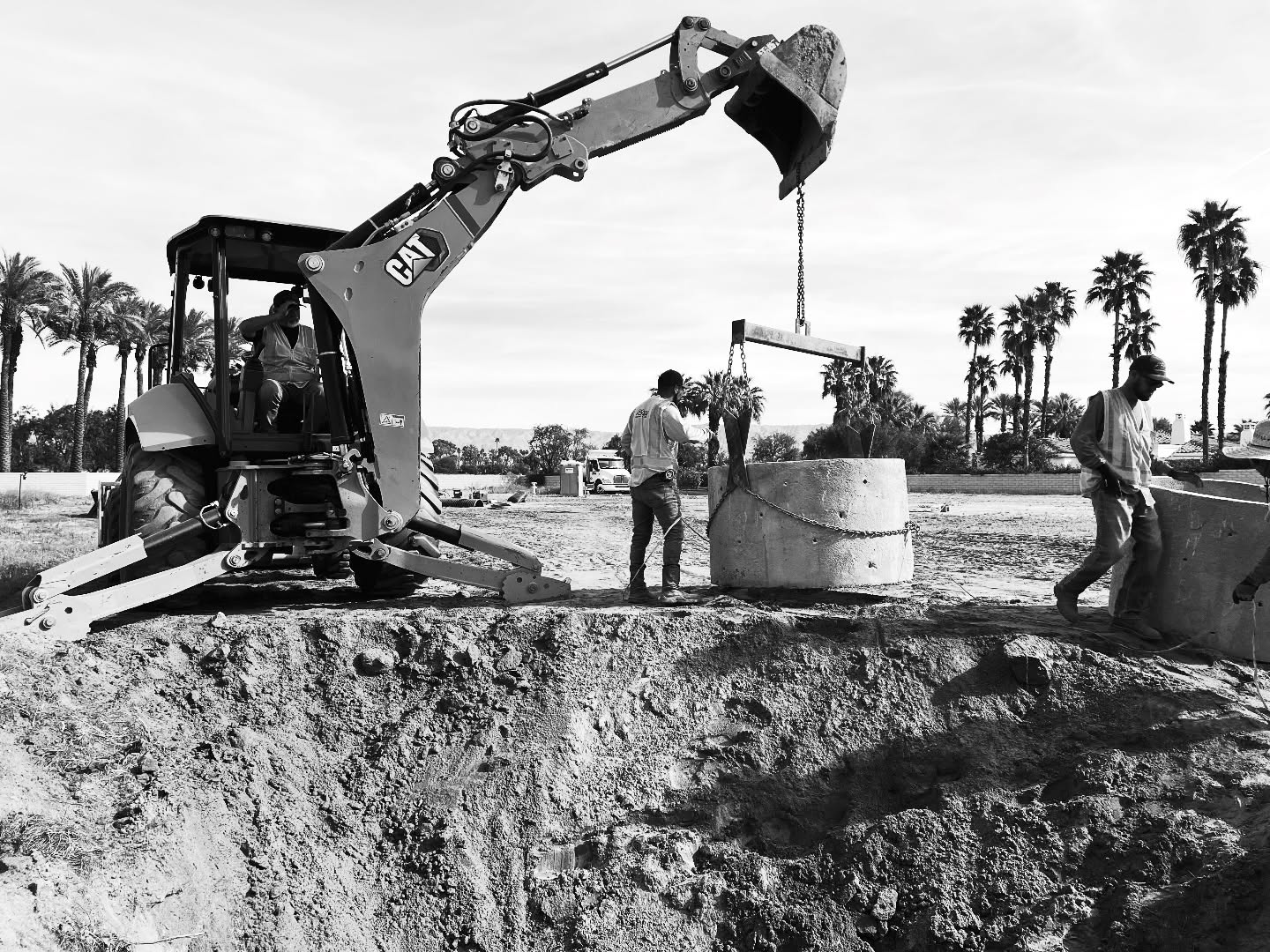 Installing a 15 ft drywell to manage stormwater and keep this site draining properly.
Proper drainage isn’t optional — it protects foundations, pavement, and the entire project long term.