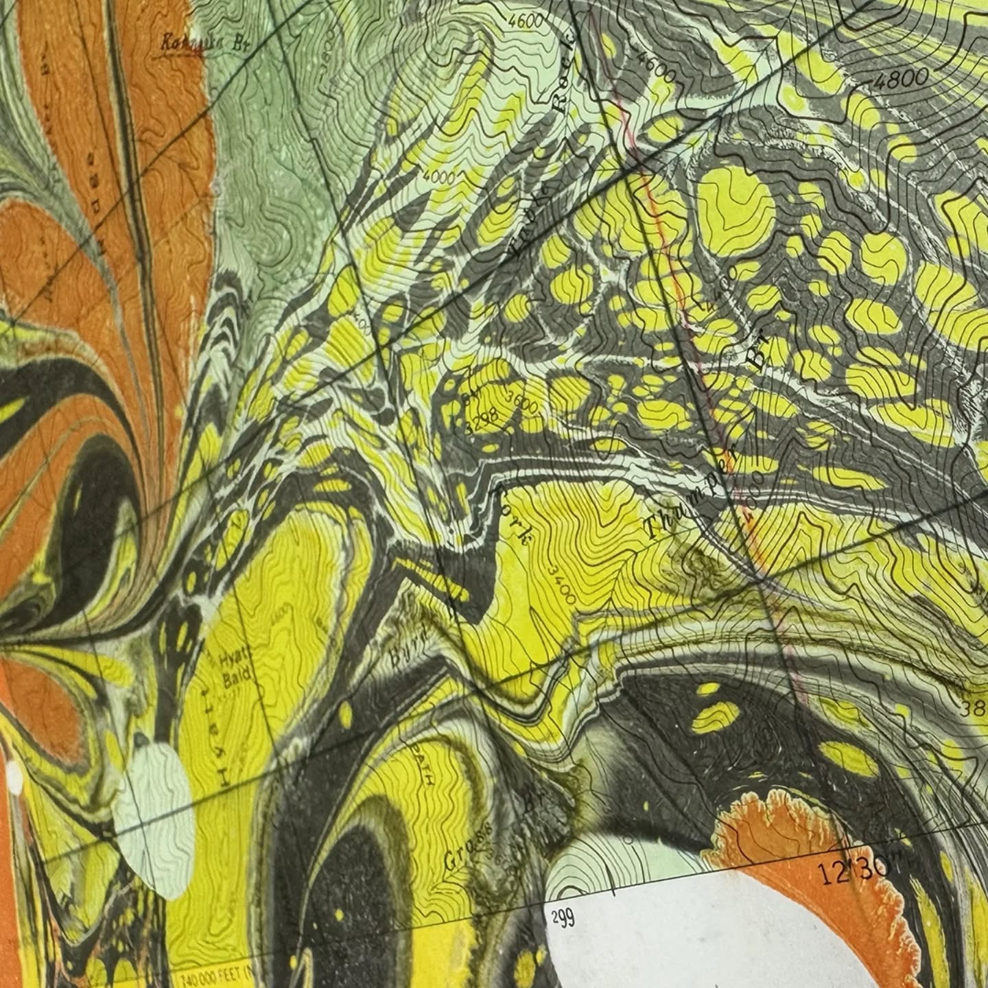 “LUFTEE” (detail) marbling on vintage topo map
Luftee comes from Oconaluftee, which was uncustomarily shortened by the Anglo-American settlers from the Cherokee word, Egwanulti, meaning ‘by the river’. And it is indeed a river which flows freely through the Qualla Boundary, owned by The Eastern Band of Cherokee Indians, the only Federally recognized tribe in North Carolina. The Oconaluftee River drains the similarly named river valley into the Tuckaseegee River.
#majikstudios207 #marbledmap #usgeologocicalsurveymaps #topographicmaps #juneexhibit