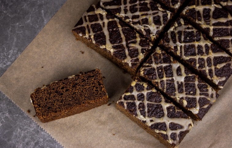 Ok… so somehow we are approaching the end of February and we haven’t shared a Bake of the Week yet for 2026. We’ll take that as proof of just how busy our bakery has been!
But, we’re putting that right and kicking things off today with a new and improved version of our Sticky Ginger Cake.
Rich, dark and wonderfully sticky as the name suggests, this updated recipe gives an extra-soft, melt-in-the-mouth crumb. Golden syrup, treacle and plenty of warming stem ginger bring that perfect balance of sweetness and gentle spice, while a bright lemon glaze cuts through the richness beautifully.
It’s nostalgic, it’s delicious, and it’s perfect with a good cup of tea or coffee.
Trade customer? 🍪
This traybake is available uncut or pre-cut into 14 generous portions, for super simple serving. Suitable for freezing, it really is the ideal option for busy coffee shops, farm shops and delis. Explore our full range and register as a trade stockist at www.willow-finch.co.uk/trade
Retail customer? 🍪
If you’re simply in the mood for a treat, you’ll find Sticky Ginger Cake in our treats section - with free delivery on all UK orders.