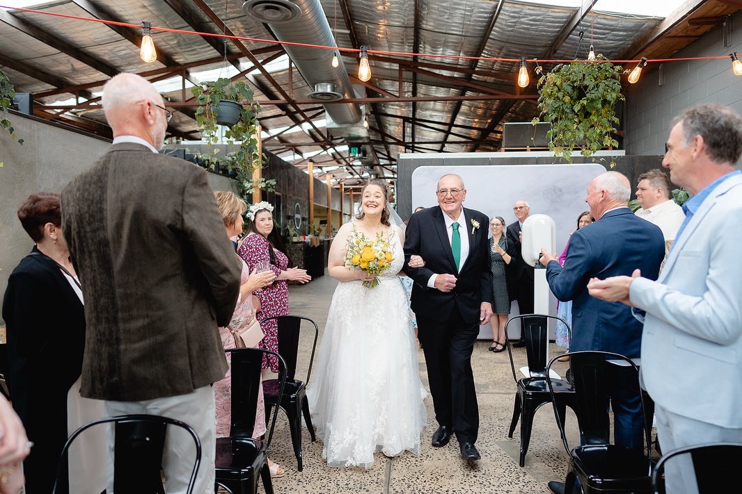 Tash and Ben’s ceremony at Industry 26 unfolded in the most beautiful way.
From the walk down the aisle on her father’s arm to the shared smiles as they spoke their vows, every moment felt intentional and close.
Surrounded by their favourite people, they created a ceremony that felt calm, deeply personal and entirely their own.
#geelongboutiqueweddings
@leaduffycelebrant
@mikeatchisonphoto