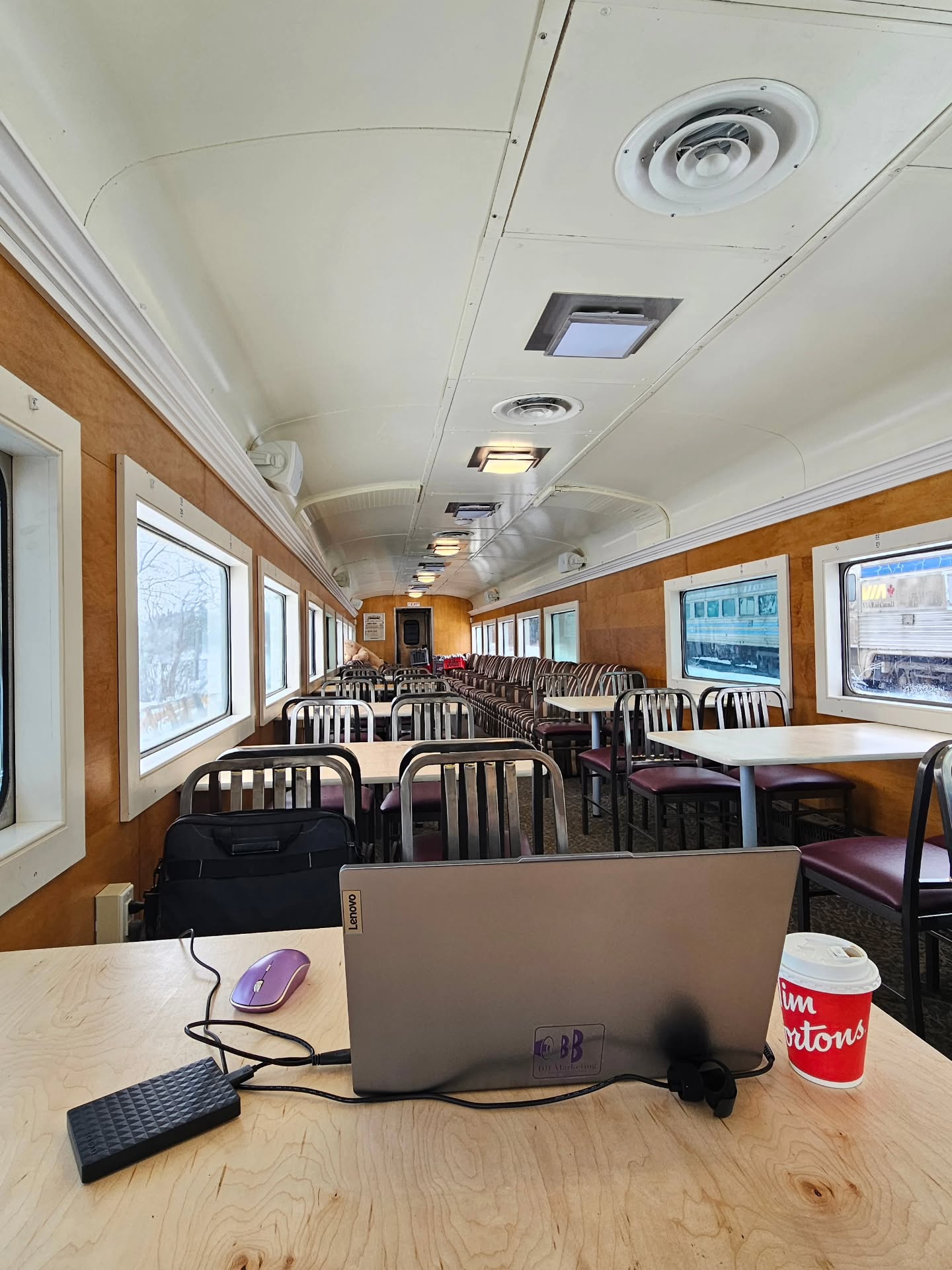 Running a small business often means your “office” can move when you do.
Today’s workspace: a heritage train lounge car filled with natural light. 🚂
Creativity loves a little change of scenery.