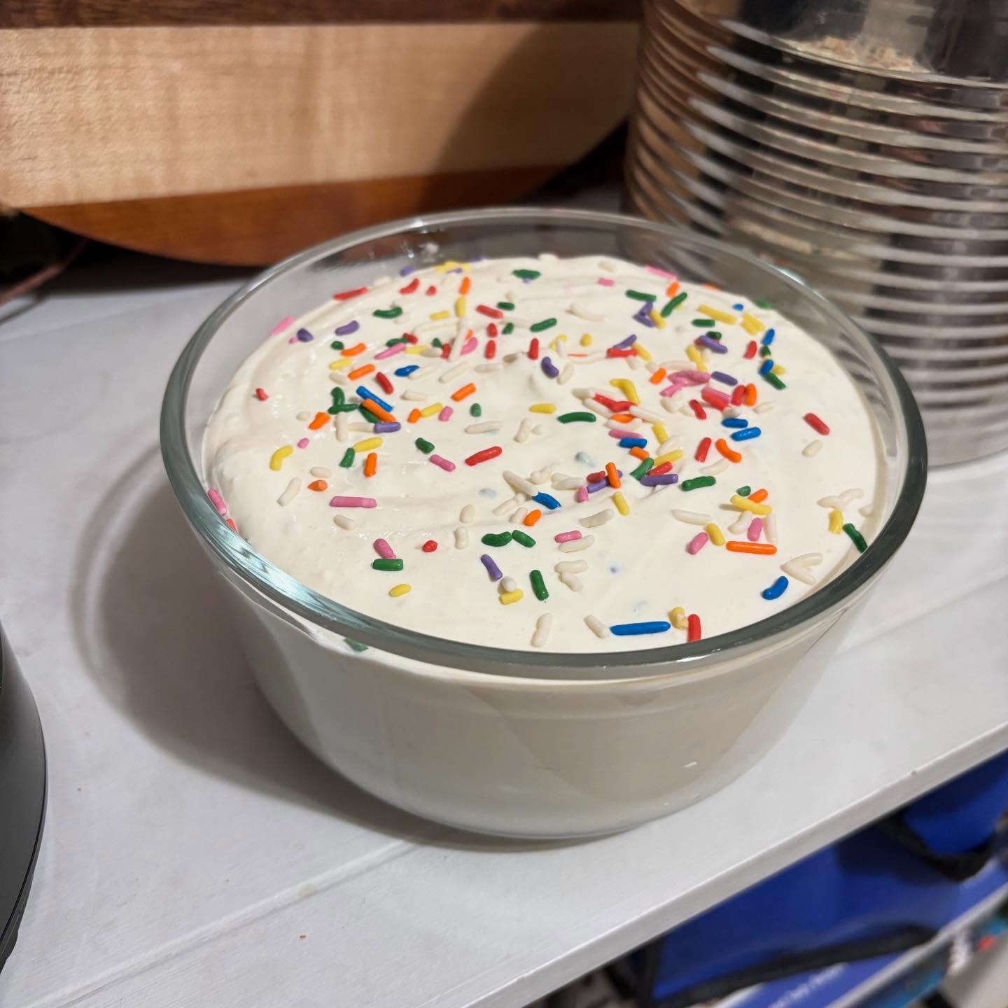 Updated & new photo: Protein Fluff Dessert 🍨
So good we had to make it again 🤌🏼
If you love a sweet treat but also want protein, this one is for you.
Protein Vanilla Fluff
Ingredients
1 cup nonfat Greek yogurt
226 g zero sugar Cool Whip
2 rounded scoops vanilla whey protein
6 tsp rainbow sprinkles
2 tbsp sugar free vanilla pudding mix
1 tsp vanilla extract
Directions
Add Greek yogurt, pudding mix, protein powder, and vanilla extract to a bowl and mix until smooth.
Gently fold in the Cool Whip until light and fluffy.
Fold in sprinkles last.
Scoop into servings or one bowl and freeze for about 10 to 15 minutes.
Right before eating, whip it with a fork to get that firm, fluffy, ice cream like texture.
Enjoy with pretzels, fruit slices, rice cake, or any vessel of your choice.
This makes about 5 cups total.
Serving size is ½ cup.
Makes about 10 servings.
Macros per ½ cup serving
Calories about 70 to 75
Protein about 7 g
Carbs about 8 g
Fat about 2 g
This is one of my favorite ways to make a dessert feel indulgent while still supporting protein goals and blood sugar balance. It hits that sweet, creamy craving without needing a lot. You can also play with additions to make it your own.
Save this for later or share with someone who loves dessert but wants more protein 💪🏼💚
#protein #abetterpathtowellness #dessert #nutritionist #nurse