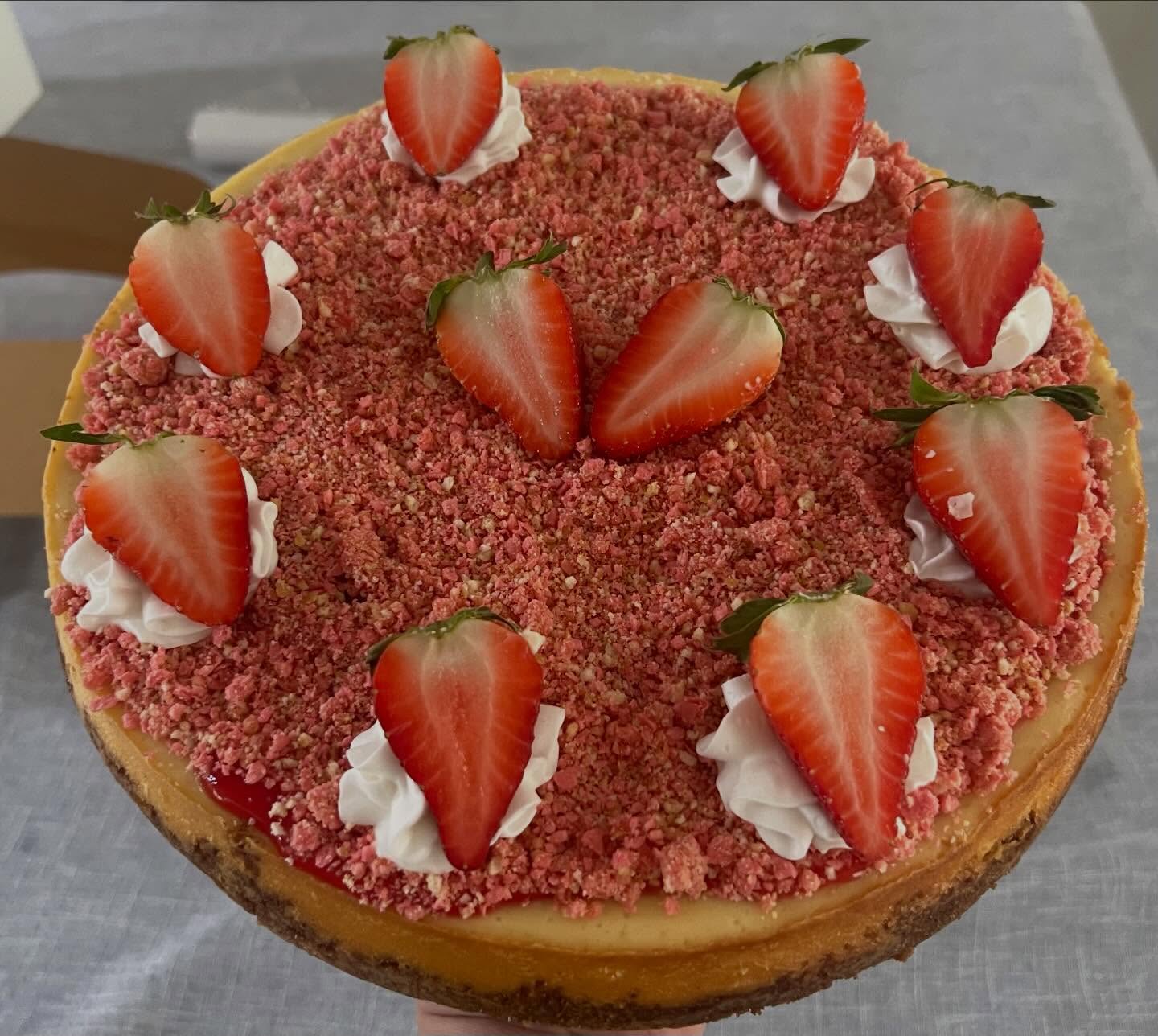 Strawberry Crunch Cheesecake for a birthday celebration 🥳 Remember to ordered your yummy treat today.. March is filling up fast