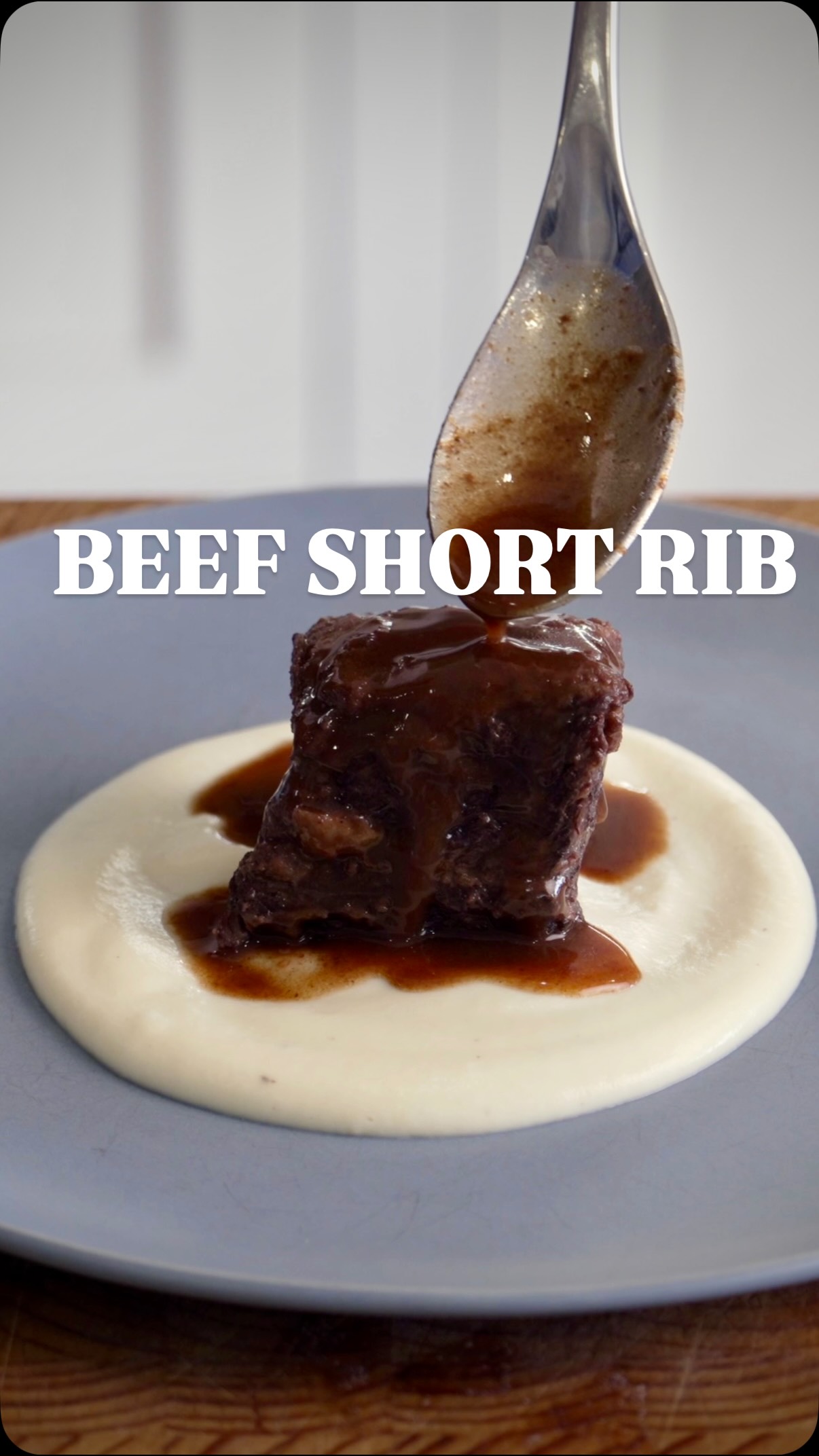 This is the TENDER TASTY Beef Short rib #recipe you’ve been looking for! Find out the tips and tricks to get maximum flavour out of these ribs and sauce. Recipe below 👇
Beef Short ribs 10-15 (or 1.3kg Chuck)
4 Shallots cut in half
2 Carrots chopped
2 Celery sticks chopped
1 Garlic head
Few Sprigs Thyme
Few parsley stalks
2 Bay leafs
2 Star anise
1/2 Tbsp Anchovy paste (optional)
Bottle Red wine
1L Beef stock
2 Spoons Beurre Manie (20g Butter + 20g Flour)
Splash red wine vinegar
25g Butter
100g Flour for dusting
Salt and Pepper to taste
Season short ribs well, coat in flour, and sear in a heavy pan until golden brown. Remove and add vegetables, herbs, star anise, and anchovy paste if using. Sauté for 5 minutes. Add wine, stock, and beef, bring to a boil, skim off scum. Simmer then add a cartouche. Cover and bake in a preheated oven at 275F-135C for 3-4 hours or until tender. Strain the liquid and pour it back over the beef. Chill overnight or a few hours. Remove the solidified fat, strain the liquid, reserving half a cup. Reduce the cooking liquid with vinegar and beurre manie by 80%. Add the rest of the butter. Season to taste. Reheat the short ribs in the reserved stock. Serve with cauliflower puree and jus.
#chefsofinstagram #beef