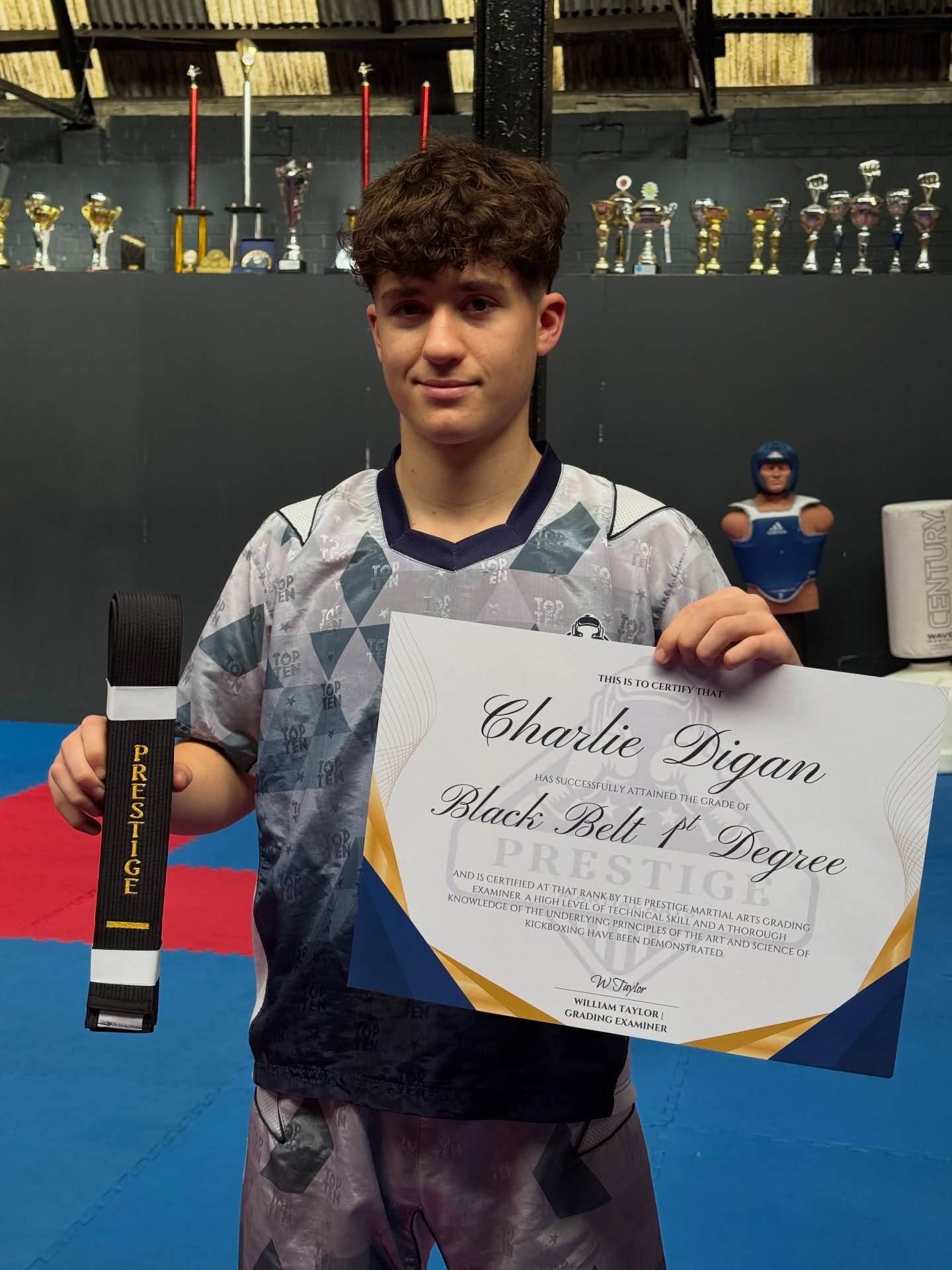 Prestige Black Belt 🥋
After 12years of training @charlie__digan successfully achieved his 1st Degree Black Belt. A true representation of his dedication and graft towards becoming a true martial artist. 👏🏼
Charlie joins his dad, Coach Trev, in the ranks as a Prestige Black Belt, leading by example and a role model to our new students. 🤝
A massive congratulations to Charlie in reaching this milestone and continuing to help and guide those that follow in his footsteps 🫡
#kickboxing #blackbelt #nottingham #martialarts #nottinghammartialarts
