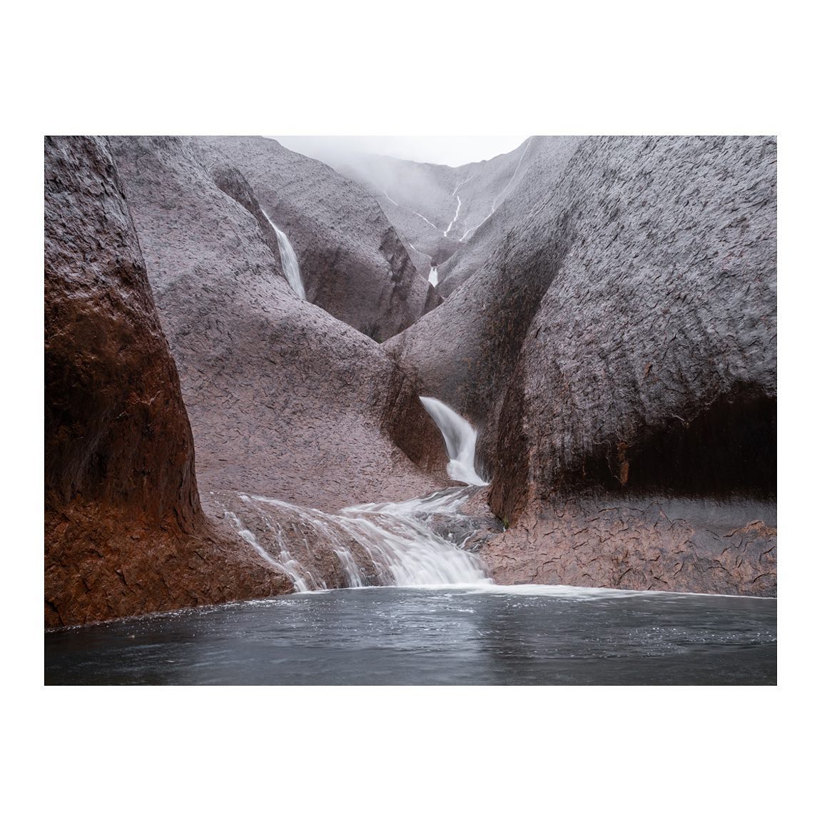 The most peaceful spot to sit and ponder around Uluru.
We were so incredibly lucky to witness this weather system drift right over the park and saturate the rock. Watching these waterfalls form right in front of you is simply breathtaking.
#australia #fujifilmgfx100s #fujifilm #australiagram #outbackaustralia #outback #uluru #ulurukatatjutanationalpark #australiangeographic #nt #ntaustralia #coloursofnature #outbacknt #seeaustralia #discoveraustralia #getoutstayout #pond #waterfalls #landscape #landscapehunter #visitnt #country @fujifilmx_au @travelaustralia @australia @visit.nt @exploreuluru @seitoutbackaustralia