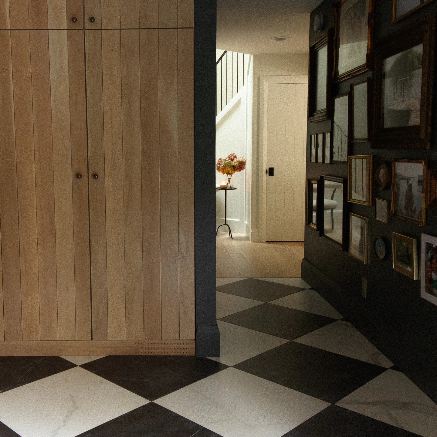 About that time of year to swap out the beach towels for the backpacks. We designed these built-in lockers to hold all the gear but to keep it hidden. The collected vintage frames were inspired by my grandma's house. When you walked into her home, you were greeted with black and white photos of my dad and my aunts and uncles from their childhood. My favorites were the photos of them in by grandpa's boat, catching huge fish in Lake Michigan. I loved looking at them as I walked in and walked out. I can still close my eyes and see the photos. A mudroom is a perfect place to display family photos. It reminds the people who live in the home of all the people who they love and love them every time they come and go. ❤️
Design @cassieklassenhome
Photos @katieskinner.interiors
Carpentry @kattdesign
Doors & Trim @danbrentana
Railings @kyleburnettart
Vintage @866_pine_st @brassmoonvintage @bellwethervintageshop
#westmichiganinteriordesign
#nortonshoresinteriordesign
#mudroom
#muskegoninteriordesigner
#vintageframes