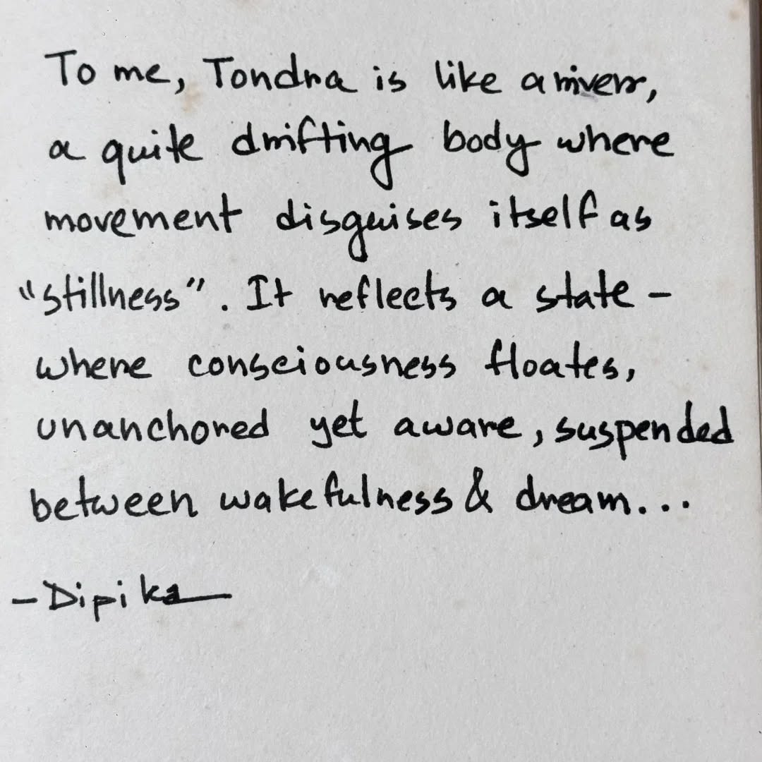 Our story of TONDRA emerged from a moment of heartbreak at DAS 2023. A young visitor began writing messages on the walls of our exhibition for a woman named Tondra—phrases like, “Everyone is here, but you are missing from my life.”
His words moved between graffiti and poetry. He described his Tondra as “a cloudy day,” weaving his deepest personal emotions with references to the stories and films of Humayun Ahmed, Zahir Raihan, and the songs of lyricist Ukil Munsi.
It was our Art Mediators who noticed and discovered this gesture, allowing it to grow into something shared rather than erased.
Here are two reflections from our Art Mediators of what Tondra means to them:
“To me, Tondra is like a river — quietly drifting, where movement disguises itself as stillness. A state where consciousness floats, aware yet unanchored, suspended between wakefulness and dream.”
— Dipika
“Tondra feels like a warm embrace from myself — a comforting hug that reconnects body and mind. A gentle escape from the noise of the world.”
— Oindrila
Tondra exists differently for each of us, yet is connected by a shared state, somewhere between reality and dream.
What is Tondra to you?