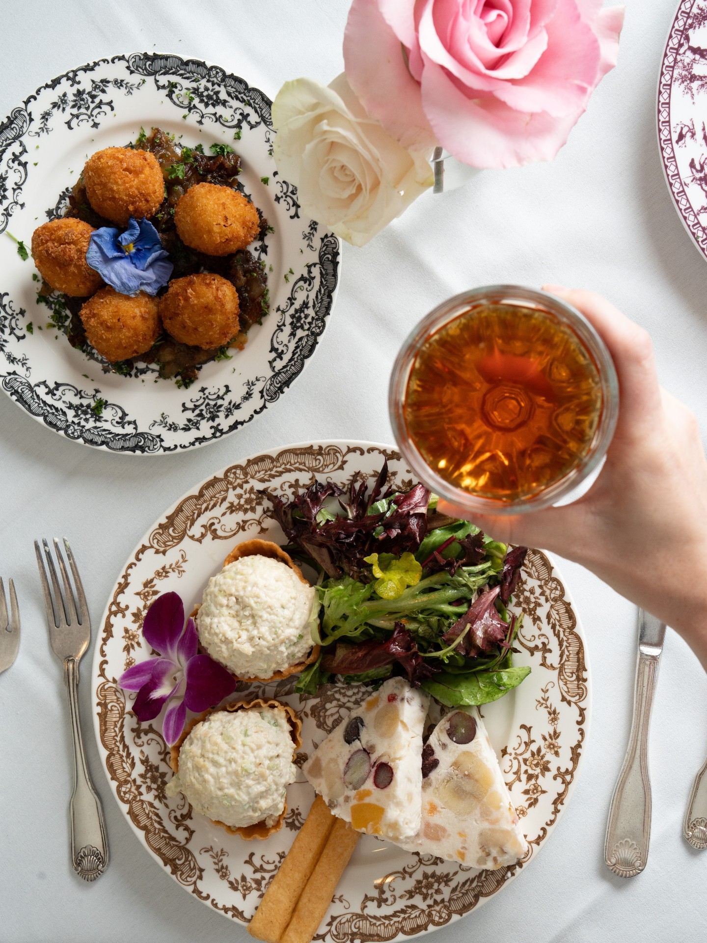 Our Swans Favorite dish is a guest favorite for a reason. A perfectly balanced plate featuring our Signature Chicken Salad, House-Made Timbales, Petite Lettuces with Champagne Vinaigrette, Signature Frozen Fruit Salad, and Cheese Straws. Come visit us and see why this is one of our most popular dishes, Tuesday – Saturday, 11 AM – 2:30 PM!