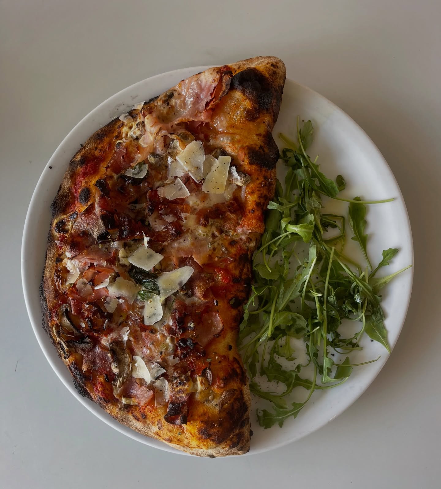Friday Special, The Calzone
Filled with tomato sauce, fiordilatte, sopressa, ham, mushroom, ricotta and cream and topped with tomato sauce, ham, sopressa, mushroom, ricotta and bacon