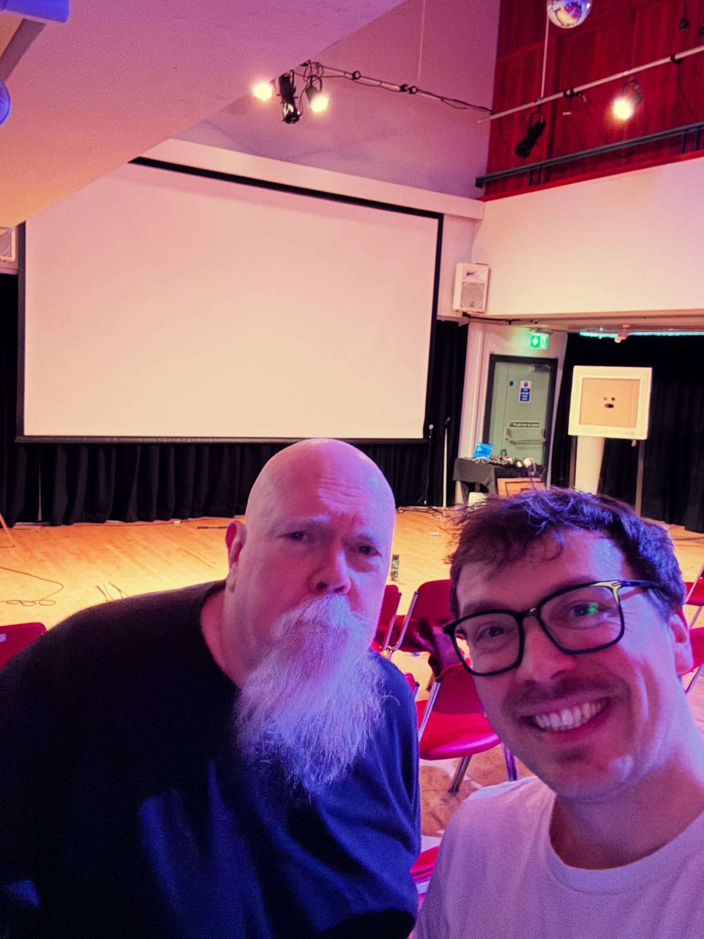Show one complete!
Thanks to everyone who came to watch my first show of @leicscomedyfest yesterday @attenboroughac for the first ever Work-in-Progress of Dream Park, the show where families dream up and apply for planning permission for the worlds greatest theme park.
We had a very on theme for Leicester theme park called Red Leicester based on Cheese. And we got the green light!
Best of all, someone even made some fan art of the park after the show - our first fan art!
1. Me and tech expert Steve
2. Me and a big ol projector screen
3. Me realising I made a mistake hiding behind a heavy black curtain on stage for 20 minutes before the show started
4. The precious fan art
5. Scared Shrekless on DVD, which if we take the translation of Shrek as analogue, really puts a dark spin on the Christmas special Shrek the Halls