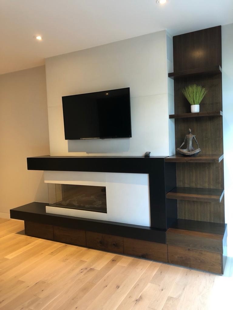 Clean lines. Bold contrast. Fully custom.
This fireplace surround + millwork feature wall was designed, fabricated, and installed entirely by us — from the floating black hearth to the integrated shelving and seamless firebox wrap.
We love how the rich wood tones balance the crisp white surround and matte black details. Modern, architectural, and built to anchor the entire room.
Every element made to order. Every detail intentional.
Interested in a custom feature wall for your space?
DM us to start your design.
#CustomFireplace #ConcreteDesign #FeatureWall #ModernInteriors #TorontoDesign CreteSTRÖM