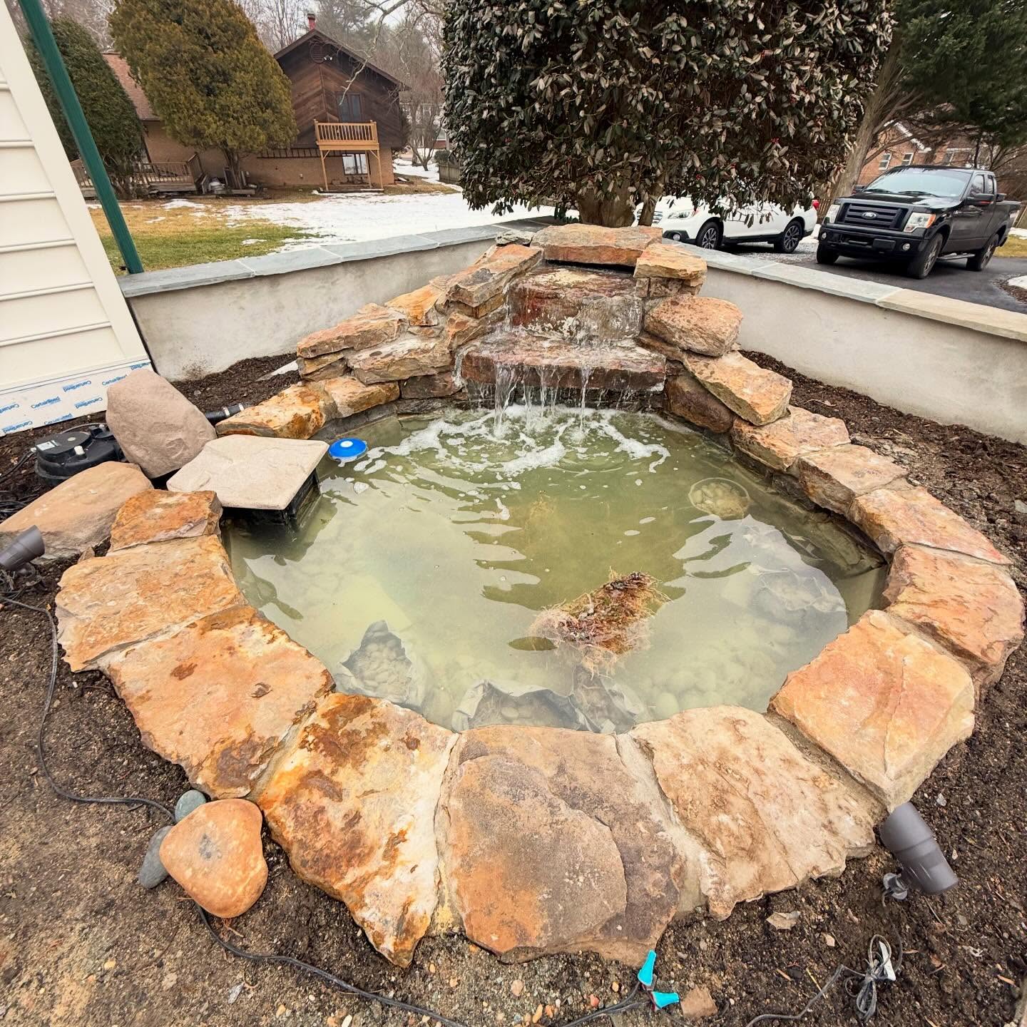 5x7 Koi Pond with a two tier waterfall.