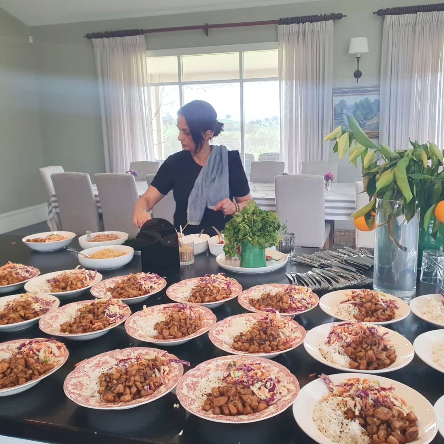 Mid-plate and mid-thought, you’re caught in one of those easy, happy kitchen moments, focused but smiling, completely in your element. You’re plating up with a relaxed confidence, having a little fun with it, while a trusty tea towel hangs over your left shoulder like a badge of honour. It’s the look of someone doing what they love: creative, present, and quietly grateful for the chance to cook, share, and enjoy the moment.
#RetreatVibes #RetreatCooking #retreats