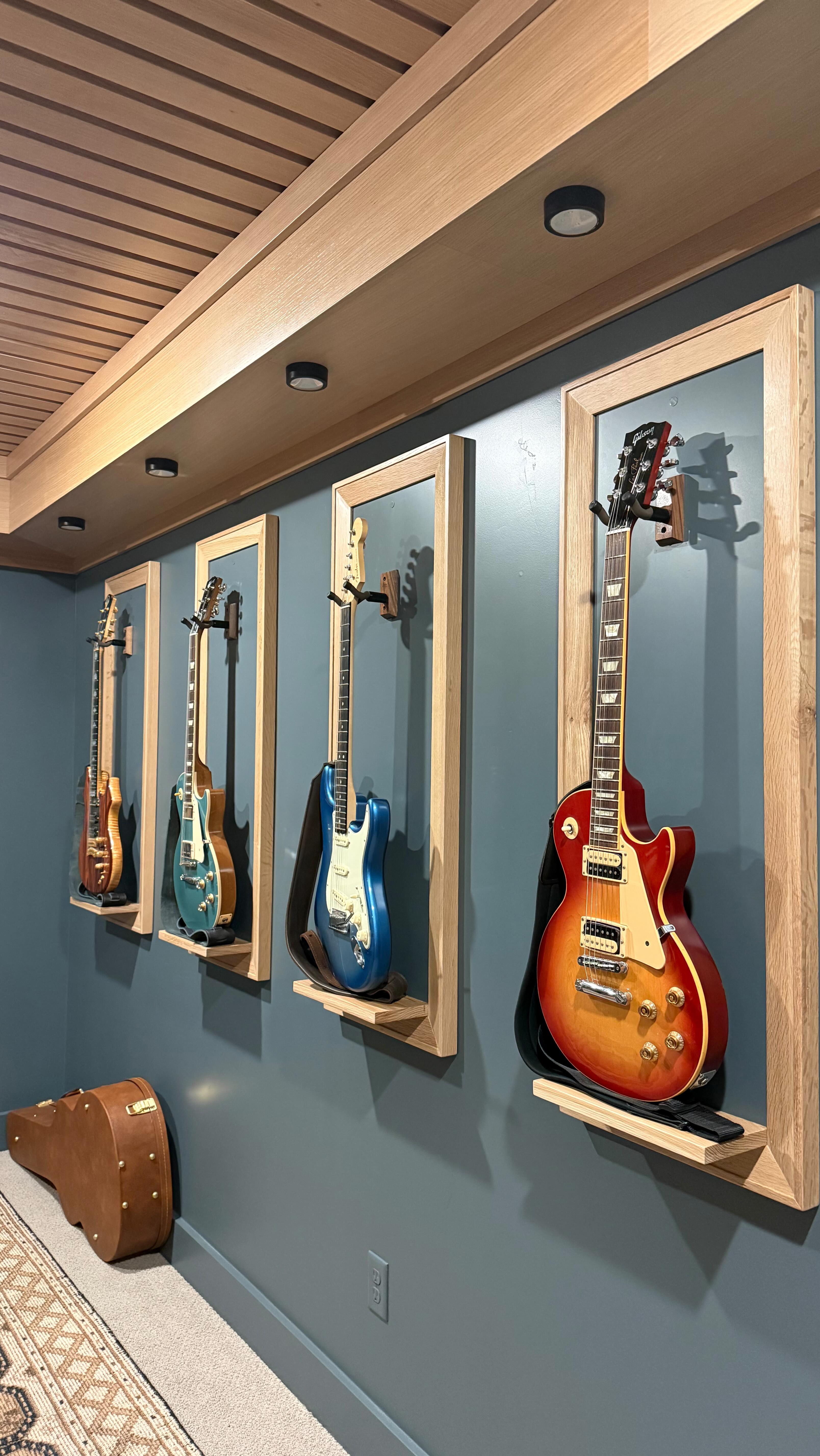 Designing a music room for a jazz + rock n’ roll lover? Say no more.
We leaned into deep, moody color, layered lighting, a custom ceiling detail, and wall-mounted guitars that double as art. Functional storage tucked in seamlessly so the room feels curated, not cluttered.
Hands down one of my favorite transformations — a space that sounds as good as it looks. @dennler_furnishings
#musicroom #interiordesign #mancave #creativespace #musicstudio