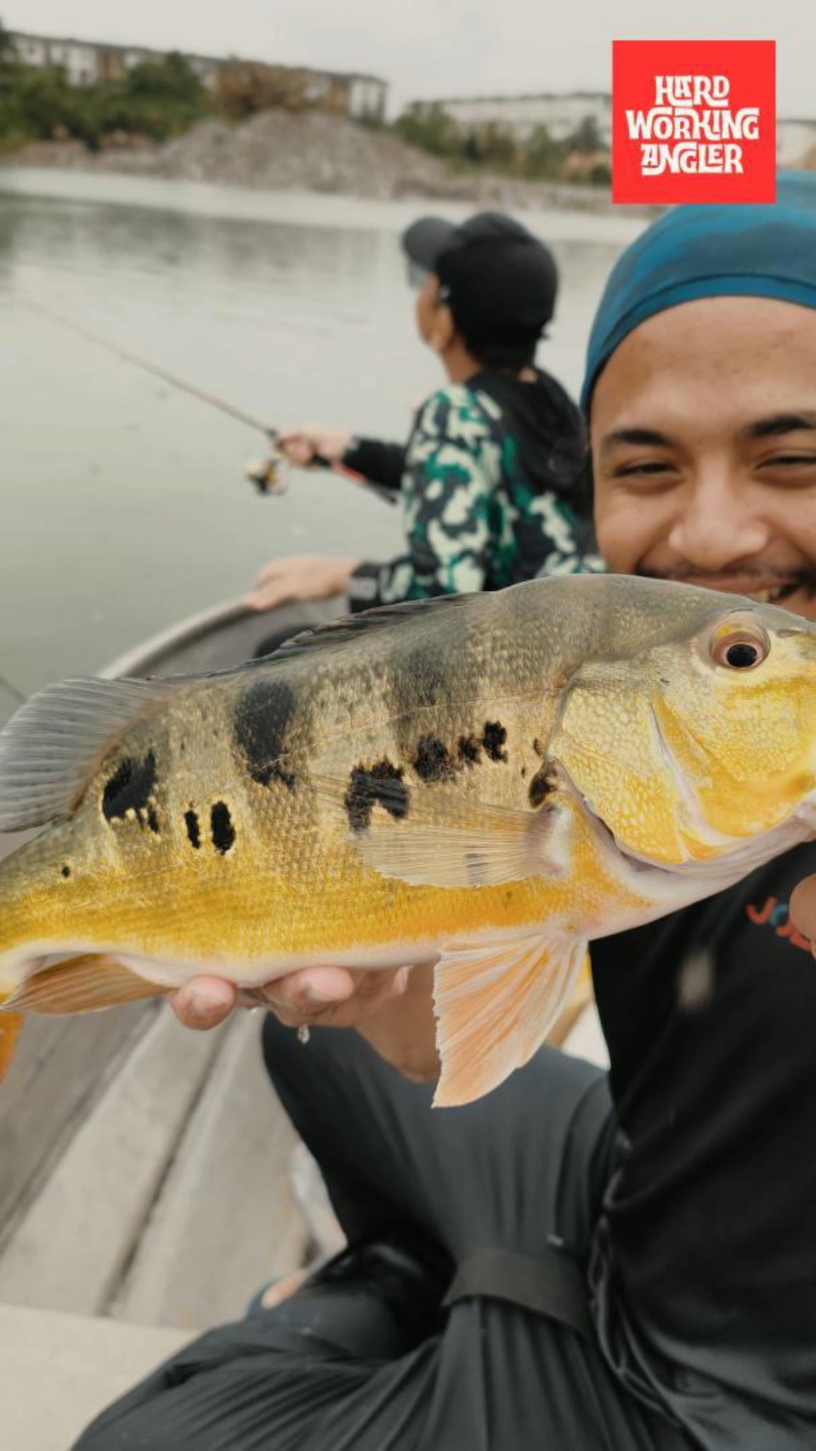 Kuala Lumpur urban peacock bass fishing. Rain or shine fishing must go on. Contact us for enquiries on our fresh water fishing trip in Malaysia. #peacockbassfishingguidemalaysia #hardworkingangler #fishing #visitmalaysia #peacockbass