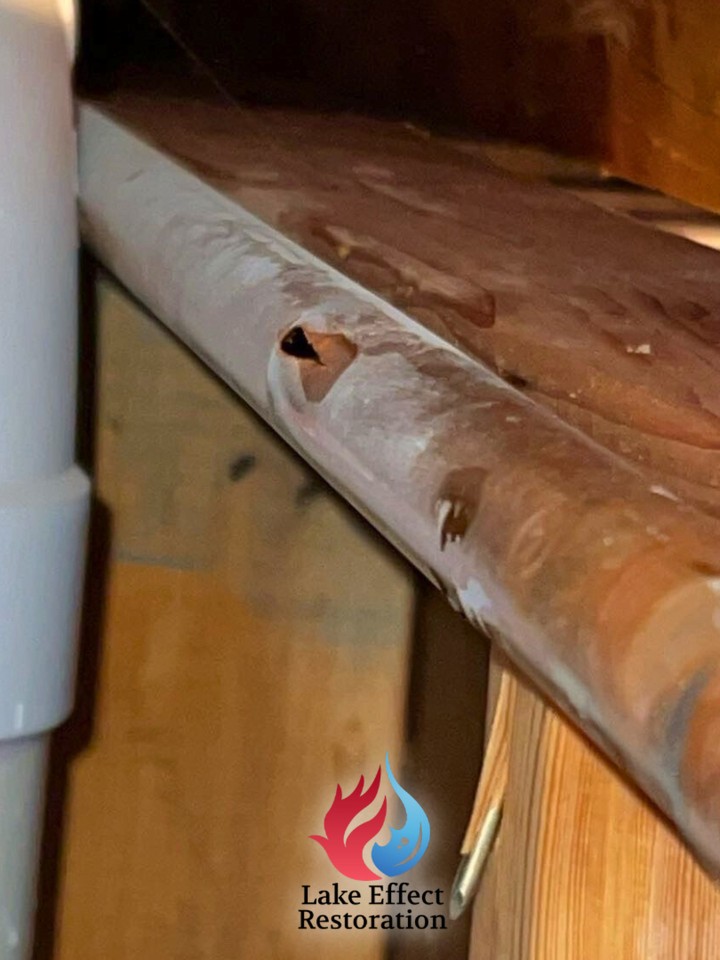 A frozen pipe can start as a tiny crack you never see coming.
When water inside a pipe freezes, it expands. That pressure builds fast, and even a small split can release gallons of water in minutes once it thaws. What looks like a minor break can quickly turn into soaked drywall, damaged insulation, warped flooring, and the risk of mold.
Winter in Northern Michigan brings freezing temps, power outages, and pipes hidden in exterior walls or crawlspaces that are especially vulnerable. It does not take much for a small freeze to create a big mess.
If a frozen pipe has burst in your home or business, do not wait. The faster you act, the more damage you can prevent. Call us right away at (231) 883 4183 and we will respond quickly to stop the damage and start the restoration process.