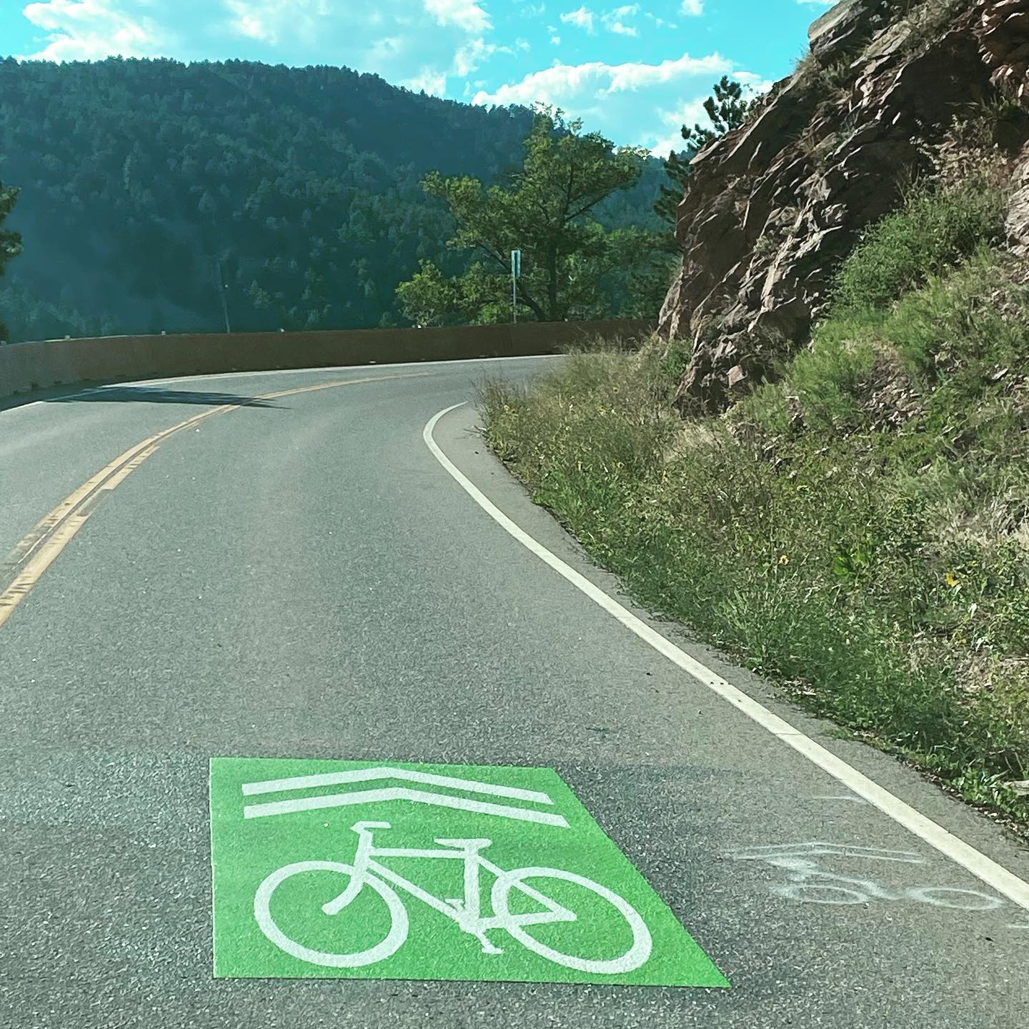 #bouldercounty placed three of these on a small section of #leehilldrive near the Bikes may use full lane sign. There are multiple blind right turns and no bike lane for a safe place for a bike doing 2-4 mph uphill to go, how is this safer for bikes and cars on this road?