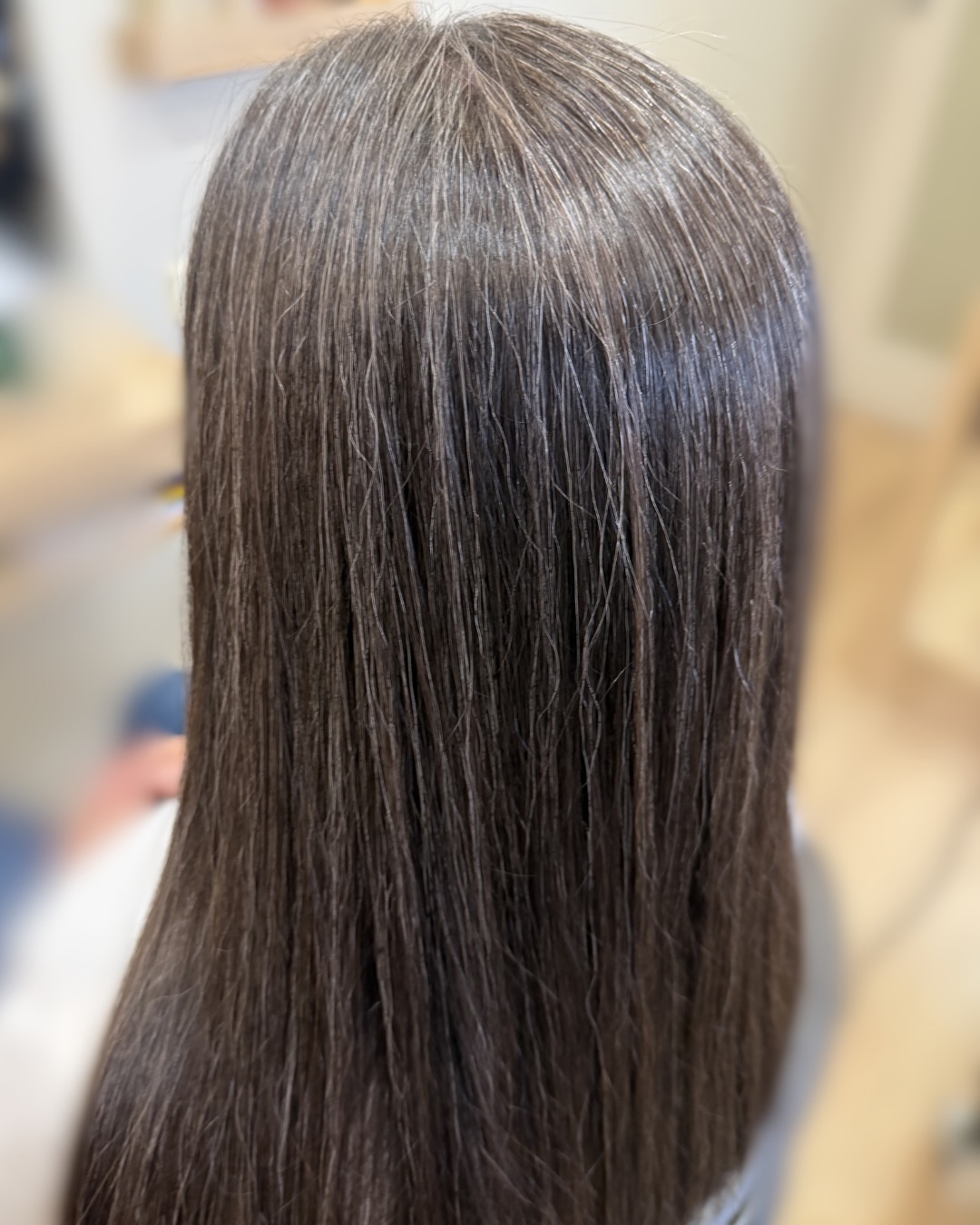 Grey hair transitioning can be one of the most empowering and beautiful experiences within your hair journey — a pathway toward discovering the colours and style that truly feel aligned with who you are.
There is something deeply confidence-building about no longer resisting what grows naturally from you, but instead learning how to work with it.
This result is from a temporary express colour transition, and the transformation is remarkable. My guest has had just two sessions, spaced five months apart, and she couldn’t be happier — not only with the look of her hair, but with its condition, which has actually improved over time. You could easily argue that what you’re seeing from roots to ends is her natural colour.
When searching for a grey hair transition specialist, it’s important to understand that there is no one-size-fits-all approach. In my experience, when you truly understand colour — your starting point, your natural base, your end goal, and what is realistically achievable in between — you open up far more options than you may realise.
Sometimes the most dramatic or invasive colour transformations are not the most aligned. There are always different pathways, each with varying levels of maintenance and commitment. What I aim to give my guests is clarity — a clear understanding of what is involved in each option, and what maintenance will realistically look like.
In some cases, there is very little ongoing upkeep. In others, there may be additional time and care woven into your routine. The key is understanding your choices so you can select the direction that feels most aligned with you.
Find out what your options are. Understand what’s involved. Then choose the path that feels right for your lifestyle, your aesthetic, and your future.