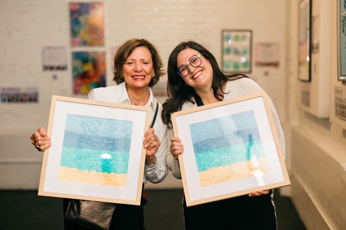 Congratulations to the Goodman Family ❤️ #POTAArtAuction Gan West: Little Hands, Big Ocean
In the Gan West classroom, our art project began with each child receiving a canvas prepared with modeling paste and covered with a layer of saran wrap. The children were encouraged to “push” with their hands, creating gentle, wave-like motions across the surface. This tactile process allowed them to explore texture and movement in a fun, hands-on way. As their little fingers pressed and swirled, the emerging patterns resembled rolling ocean waves, icy currents, and drifting snow, reflecting the movement and energy of winter water. The cool, textured designs felt reminiscent of frozen seas and winter winds, connecting the sensory experience to the season around us. This inspired the project’s title, Little Hands, Big Ocean, capturing how their simple, playful gestures came together to form something vast, powerful, and nature-inspired.
The children loved creating meaningful art using just their hands, discovering the beauty of expression through touch while connecting art to the winter world they see and feel every day.