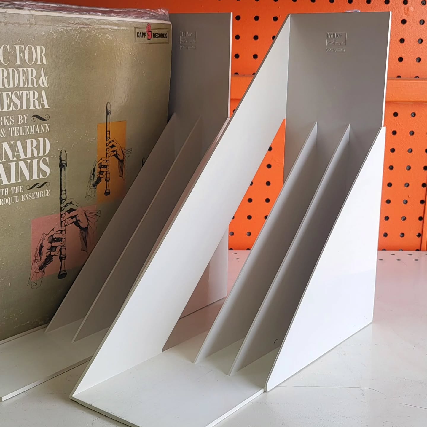 We have available 4 of these cool 70s record holders available. Made by Italian designer Giotto Stoppino Heller. -$39 each