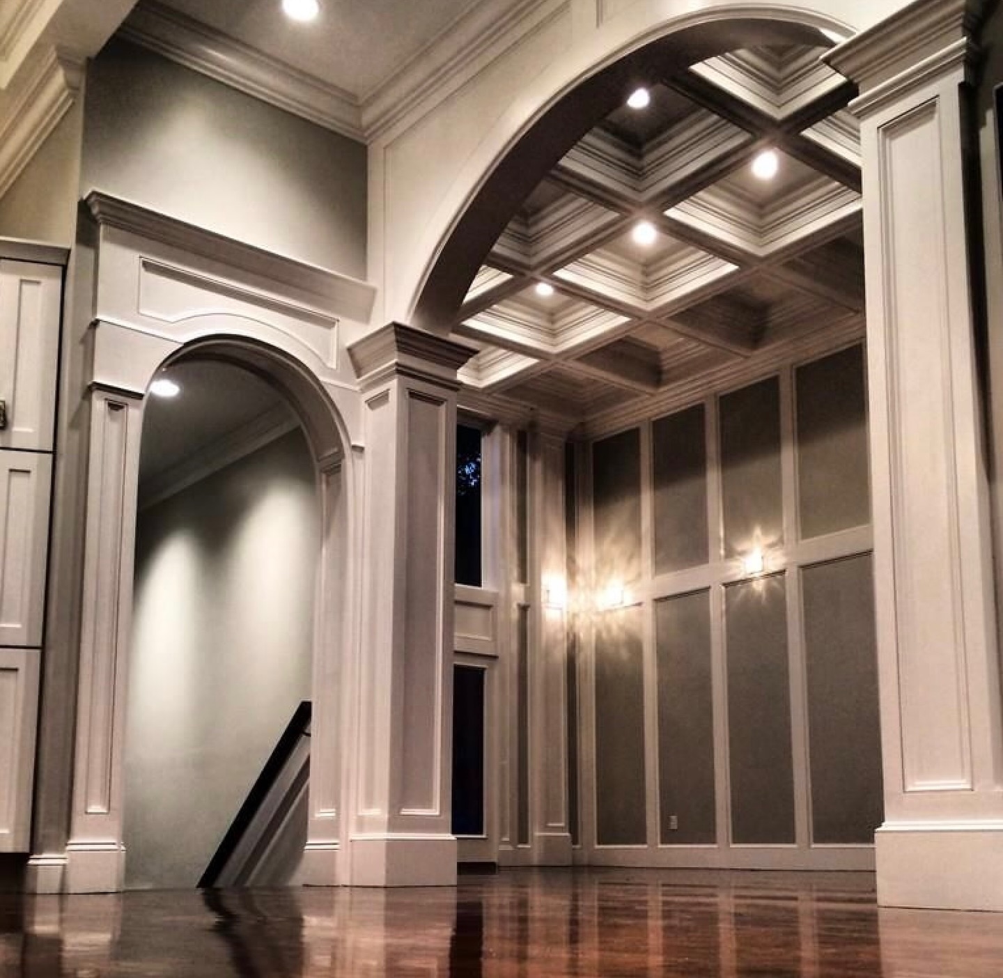 Soaring ceilings. Layered millwork. A statement arch that anchors it all.
What makes this space special isn’t just the scale — it’s the balance. The coffered ceiling adds depth without feeling heavy, the paneled walls create rhythm and proportion, and the full-height arch softens the geometry with just the right amount of contrast.
It’s the kind of craftsmanship you feel before you notice — precise profiles, clean transitions, and shadow lines that align perfectly from floor to ceiling.
Refined. Elevated. Timeless.
#echelonbuilders #architecture #custommillwork #luxuryhomes #finecarpentry