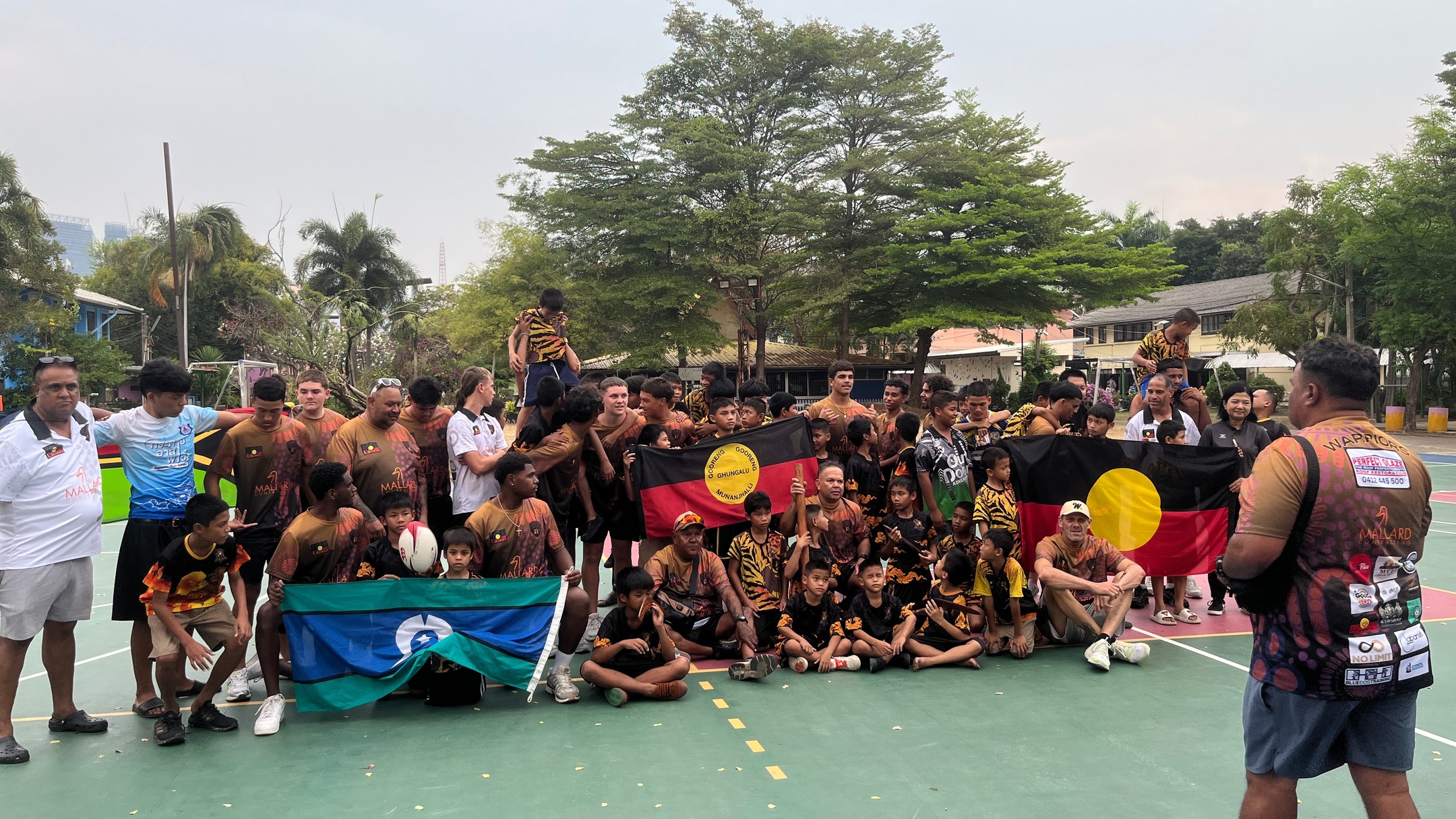 A big thank you to the First Nation Warriors for taking the time to visit our boys ahead of this year’s Bangkok 10s.
They brought members of their team to see the orphanage where many of our boys live and to hear some of their stories firsthand. It meant a lot to our kids to be seen, heard, and encouraged in such a personal way. The team spent time running drills and games together — and even shared a powerful traditional dance accompanied by the didgeridoo, which was a special and memorable experience for everyone.
We’re truly grateful for their genuine interest in what we do. Each year they make the effort to stop by our tent, connect with our kids, and often share moments together on the field as well.
Thank you again for your continued support, friendship, and investment in our team. It makes a lasting impact.