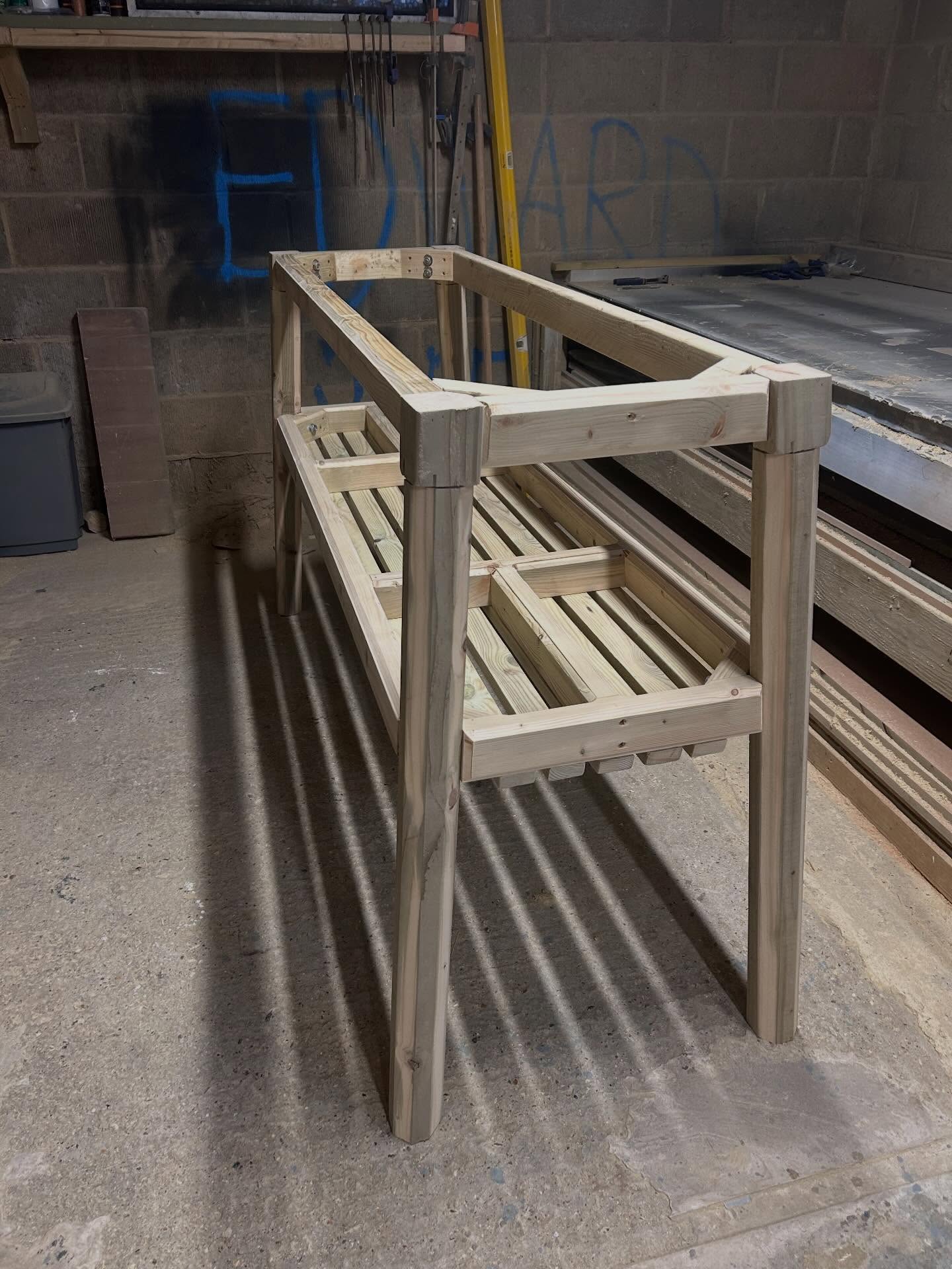Custom tall bar table base is all built and ready for its spray coat! Built to last with solid construction, perfect for indoor or outdoor use. Features a tray underneath for holding belongings, condiments, or empty glasses. Still a work in progress, but stay tuned for the finished design in my A4 flyer. If you're in the midst of a renovation or need a design refresh, keep an eye out for my upcoming flyer featuring new designs for hospitality, commercial interiors, and stylish homes. Get in touch for order inquiries. Follow for finished designs. #hospitality #bars #restaurant #refurbishment #solidtimber www.beyoubespokefurnitureltd.com