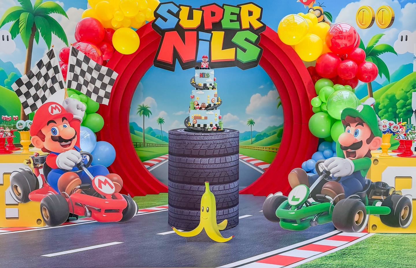We loved designing and executing this super fun Mario Kart party! When I was a kid, I loved playing Mario games, so when someone asks me for a Mario party, I get super excited! There are so many possibilities it’s such a cool, fun, and colorful theme that’s just perfect. It takes us back to our childhood, and I get really, really excited! Niu was turning 5, and he loves playing Mario Kart so imagine how thrilled I was! It was a small celebration for just 25 little friends, and we loved the result a playful, colorful party! I really hope you liked this theme, too. And if you love Super Mario and your child does as well, just count on me for the next adventure! Venue : @b_togetheruk #supermarioparty,#supermariokartparty,#supermariobirthday,#festasupermario