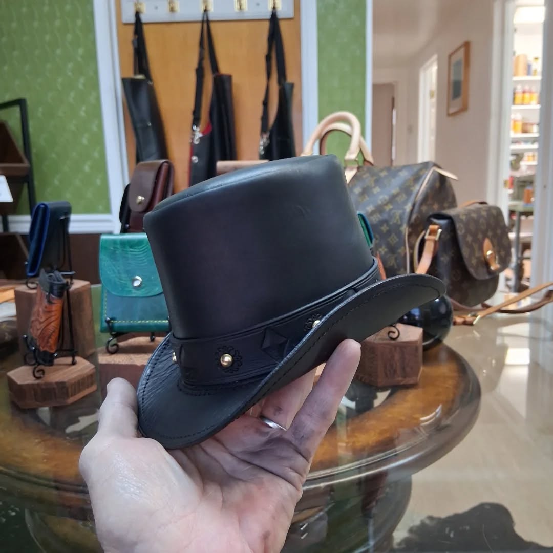 Made this miniature hat for a return customer who is a professional magician. Used for a large 8 Ball illusion. #hat #Leatherman #steampunk