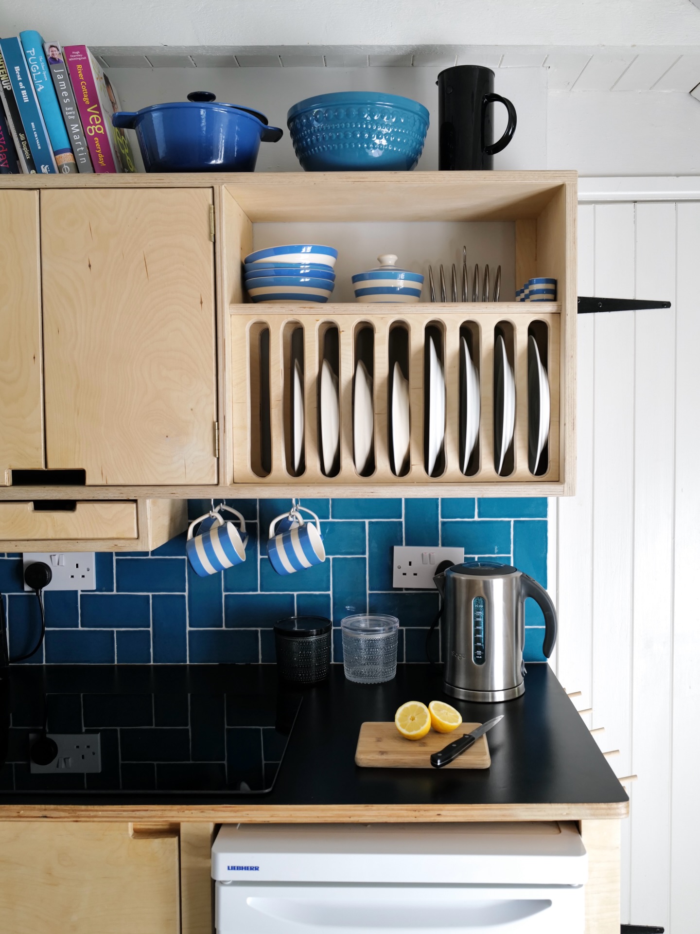 It's all about the details. The kitchen in Smugglers Lane may be small but it has everything you need to rustle up delicious meals during your stay. #selfcateringcornwall #cornwallholiday #kitchendesign #plywoodkitchen #kitchenstyle