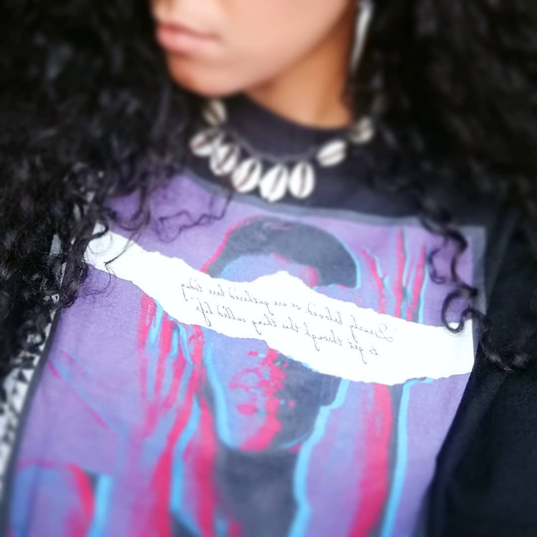 Ain't that the truth..? The line on my shirt is one of your most famous ones and like each and every one of them, beautiful written with a nod, with a ittybit of sas, but most of all TRUTH.. It is indeed exactly as it reads: "Dearly beloved we are gathered here today, to get through this thing called life.." Yep.. that whole bumpy ride with the highs, the lows, the in betweens, the 'wins' and unfortunaly (which is especially in this case an immense understatement..) the losses.. No words still.. I'll doubt there will ever be enuff.. So.. "Until the end of Time.." not only today, but everyday, until eternity... P.