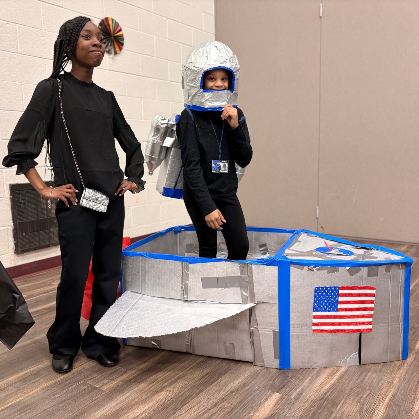 Our Black History Month STEAM Expo, “Black Brilliance, Innovations, and Future Possibilities,” delivered a program packed with memorable moments of Black brilliance.
Students across all grade levels demonstrated confidence on stage, deep knowledge of their research topics, artistic talent, humor, incredible work ethic, and strong collaboration.
The evening featured vocal performances and inspiring monologues that wowed the packed house; reenactments and demonstrations of scientific breakthroughs by Black innovators; a dance tribute to Richmond artist D’Angelo; an art museum of self-portraits; student-designed displays about scientific trailblazers; and pop-up STEAM workshops where student leaders engaged their fellow students, families, and caregivers in experiments, building tinfoil boats to carry pennies, planting seeds, and constructing back-scratchers.
Thank you to The Society, Incorporated, Chickahominy River Women, Supporting the Arts and the @chaofrva for supporting this event, and to our incredible team of teachers who guided our kids toward success.
We'll share more Black History Month highlights throughout the coming days! See more photos on our Flickr page: https://flic.kr/s/aHBqjCLzCq
#BlackHistoryMonth #STEAMExpo #BlackBrilliance #StudentSuccess #InnovationInEducation #STEAM #FutureLeaders #STEAMLearning #CommunityStrong #ArtsAndSciences #EducationMatters #dangelo #peterpaulrva