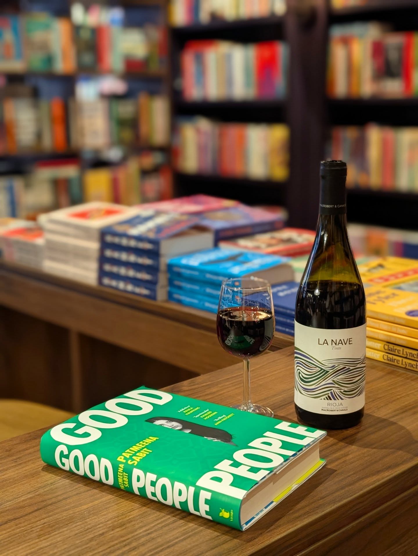 BookBar's March Book of the Month is... Good People by @patmeenasabit
Good People is a page-turning story that is pieced together through a collection of interviews. It's a gripping and tragic story, filled with humanity.
The Sharaf family is the picture of success. They arrived in America as refugees with nothing more than the clothes on their backs. And now, after years of hard work, they live in the most exclusive neighbourhood and their growing family attend the most prestigious schools. Zorah the eldest daughter is the apple of her father's eye. But when Zorah dies in an unthinkable tragedy, the family is thrust into the court of public opinion.
A novel about gossip, prejudice, and the "American Dream" that will keep you turning the pages, posing more questions than it answers.
We've paired this gripping novel with a more-ish Spanish Rioja, La Nave, a juicy drop with bright fruit, silky tannins and a fresh finish with subtle notes of oak and minerality.
Get a glass for £5 when you buy a copy of Good People from either of our shops during March.