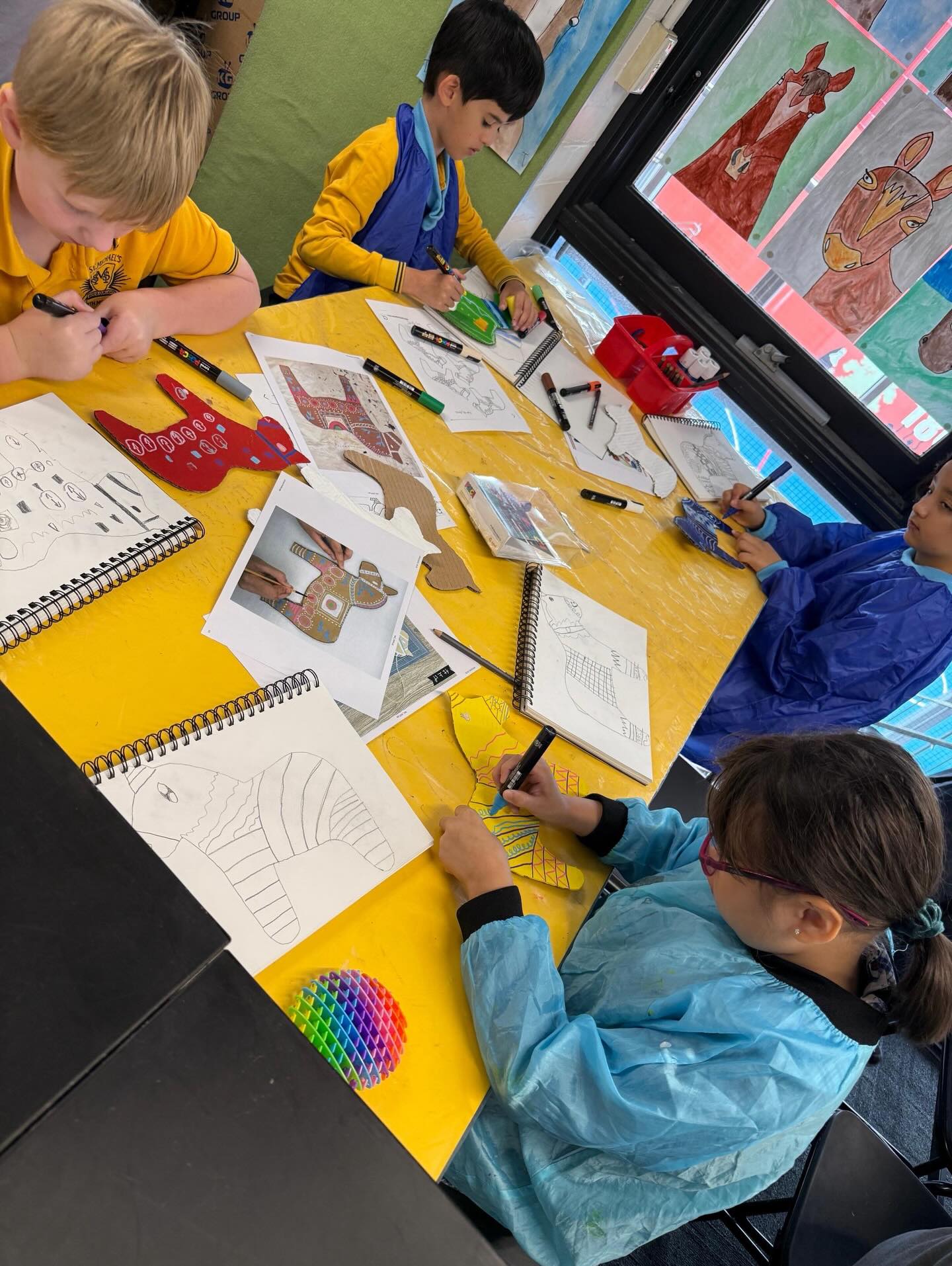 Last week the 3/4 students completed their artworks inspired by the Swedish Dala horse. Their focus was to create interesting patterns using paint pens and beads. They all look fantastic. 🐴