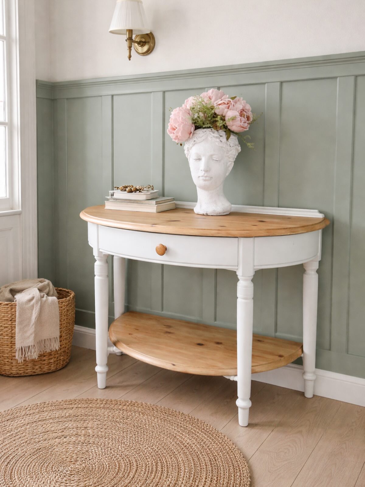 This beautiful pine demi-lune console table by Ducal has been painted in Pavilion grey by F&B. The surfaces have been sanded and waxed to feature the natural pine look.
A practical piece of furniture which sits well in a hallway setting or in fact anywhere in your house.
Measuring 88 cms wide x 47 cms deep x 70 cms high
Ā£75 including free local delivery
#pineconsoletable #consoletable #ducalpine