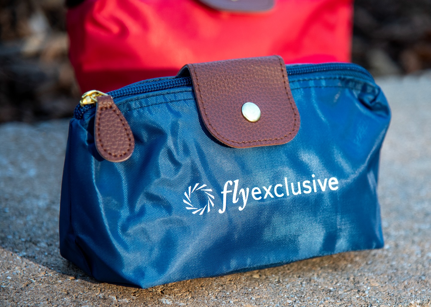 The best branded merchandise travels well. ✈️
This custom pouch for FlyExclusive was designed to feel polished, practical, and aligned with the brand experience from takeoff to landing.
Because when your clients expect excellence, every detail matters.