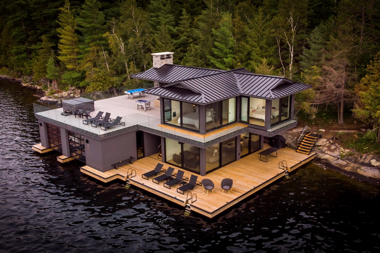 Step into elevated lakeside living with this beautifully crafted custom guest house and boathouse on the shores of Lake Rosseau.
Thoughtfully designed with expansive windows framing stunning lake views, a stylish covered lounge with a serving bar, a cozy outdoor fireplace, and sleek glass railings for a seamless indoor-outdoor feel.
A perfect blend of comfort, design, and nature.
Follow @pattymacbuilt for more home & cottage inspiration!
Follow @spencerdouglasmuskoka for more design content and inspiration.
.
.
.
Built by @pattymacbuilt
Design by @spencerdouglasmuskoka
The team involved:
Finishing Material: @centurymilllumber
Step: @weismillertimbermart
Painting Materials: @sherwinwilliams
Clear Stone, Mulch, Crush Rock: @brentquarries
Lumber, Finishing Material: @muskokalumber
Plumbing: @leeplumbingmuskoka
Electrical: @mcnairelectic