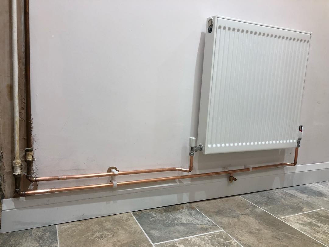 Little radiator replacement in a new kitchen recently fitted. All the rest of pipework is wall mounted in the house so had to make it look neat as I could #barloradiators #pipework #plumbing #heating #copper #engineer