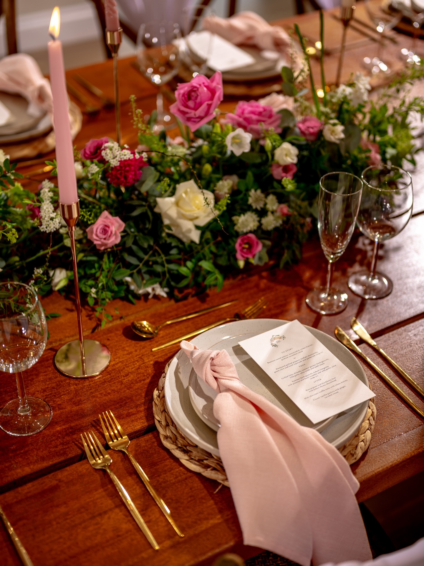 Last spring at @croftview we collaborated with @jmfloraldesigns on this layered tablescape — softness set against rich timber.
Blush linen and gold cutlery were chosen to contrast gently with the warmth of the wood, lifting the palette without overwhelming it. The florals were designed to move naturally along the centre of the table, creating a sense of flow while keeping sightlines open and conversation easy. Stationery by @daisyfosterart added a refined finishing touch to complete the look.
A table intended not only to be admired, but to be lived in — over good food, good wine and conversation that lingers.
#somersetweddingstylist #croftviewweddings #somersetwedding #weddingtablescape #somersetweddingplanner