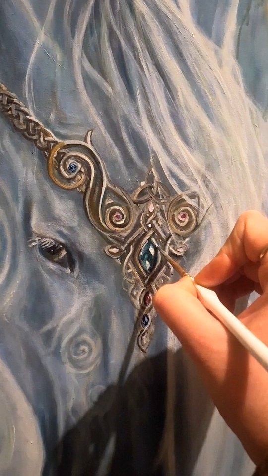 How many strokes of paint does it take? The answer is always as many as it takes... you just can not rush it.
I often think I should produce art at a quicker rate, but I am such a perfectionist when it comes to my own work. I go all in on a piece of art. I journey with it for weeks, months, sometimes even years until it is complete. Each painting is a part of me that I can only let go of once I have brought it fully forward.
This particular piece is so very nearly there. But not quite as I get the last few details just right. I must have painted over this crown about 40 times now to try get it right. It has to be right. Just like I saw in my vision. Nothing else will do!
So forgive me for how long it takes... I know some of you are waiting for prints of this to become available. Soon, I promise!
#wip #macha #visionaryart #oilpainting #Irishmythology