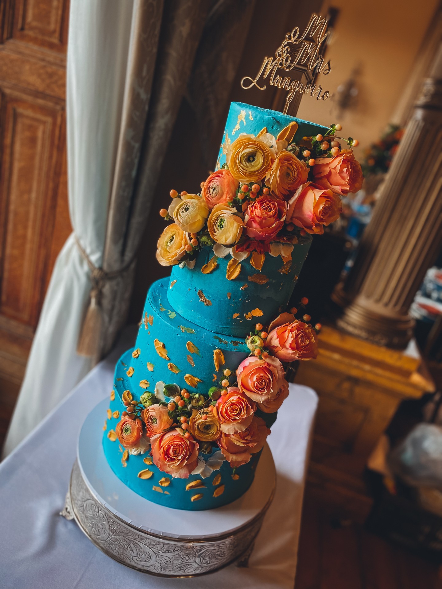 Not for the minimalist. 💙✨
A deep teal base.
Hand applied gold leaf.
Layered florals in sunset tones.
Movement. Texture. Drama.
This design was created for a couple who wanted colour, richness and presence. Something that would stand proudly in the room rather than blend quietly into it.
The contrast between the jewel toned finish and the warmth of the florals creates depth from every angle. Bold, but still refined.
If your wedding palette leans towards statement colours and you are not afraid of impact, this is where design becomes unforgettable.
Explore the wedding portfolio:
https://www.kimberlyjaynecakedesign.co.uk/portfolio
Enquire via the website to check availability 🤍
#LuxuryWeddingCake #BoldWeddingCake #TealWeddingCake #FloralWeddingCake #ModernWeddingDesign