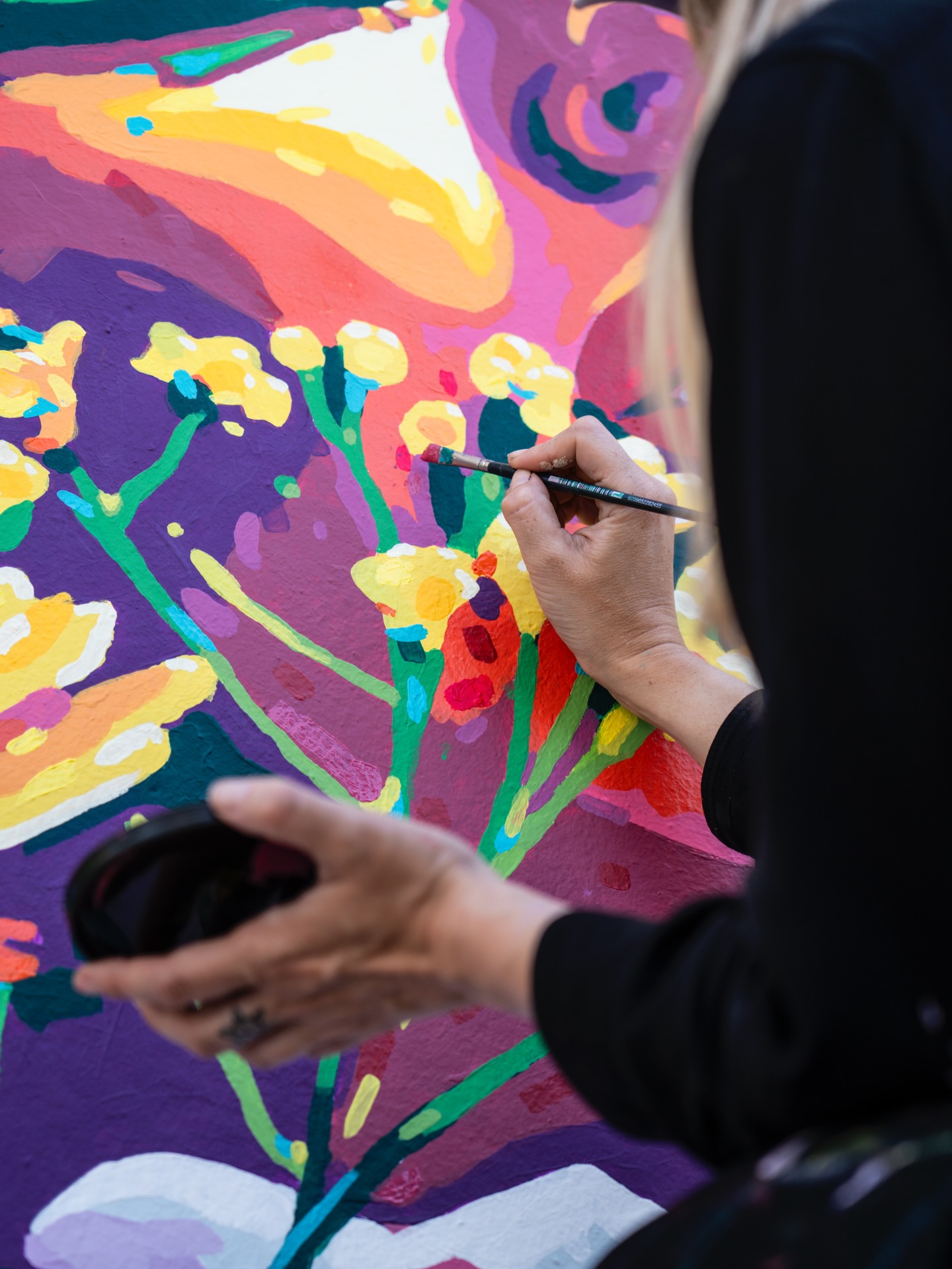 I painted my first mural! 🎨
Pulling some peculiar moves from the scaffolding, I treated the wall like fabric. I transferred my drawing (2x2.3m) onto the wall with a squillion pieces of carbon paper attached to my large printouts. The strategy seemed foolproof as long as it didn’t rain. It’s Cape Town- of course it rained.
Multiple days of painting were accompanied by some of the most amazing conversations with strangers. A day was spent on the scaffolding with mural mentor and girl extraordinaire @motelseven7 . Friends arrived with mochi and beer. It was all a solid reminder of how wonderful our city is.
@missionforinnercityct commissioned 12 artists to take part in the Bree Street Gallery, most of whom work in mediums other than street art. The artists, including @kirsten.sims , @yay_abe , @koooooos , and @amylee_originals joined the initiative to take art out of the white-walled space and make it for everyone.
Thank you for taking a risk on this embroidery gal @sj_artists_ ! This was my first mural, but not the last.
#mural #breestreetgallery #justaneedlegaltryingherbest