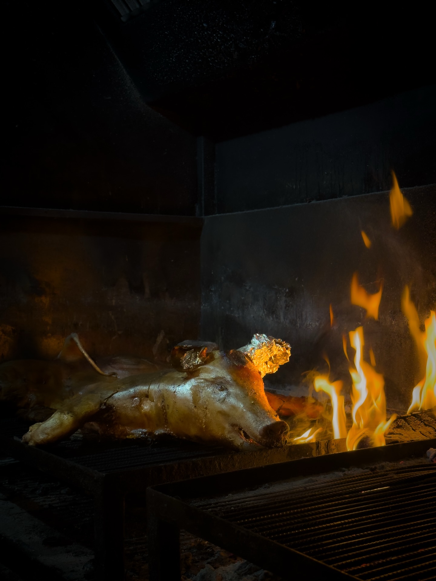 It’s been a while since we grilled whole Estonian piglet over open fire. Should we bring it back? 🔥