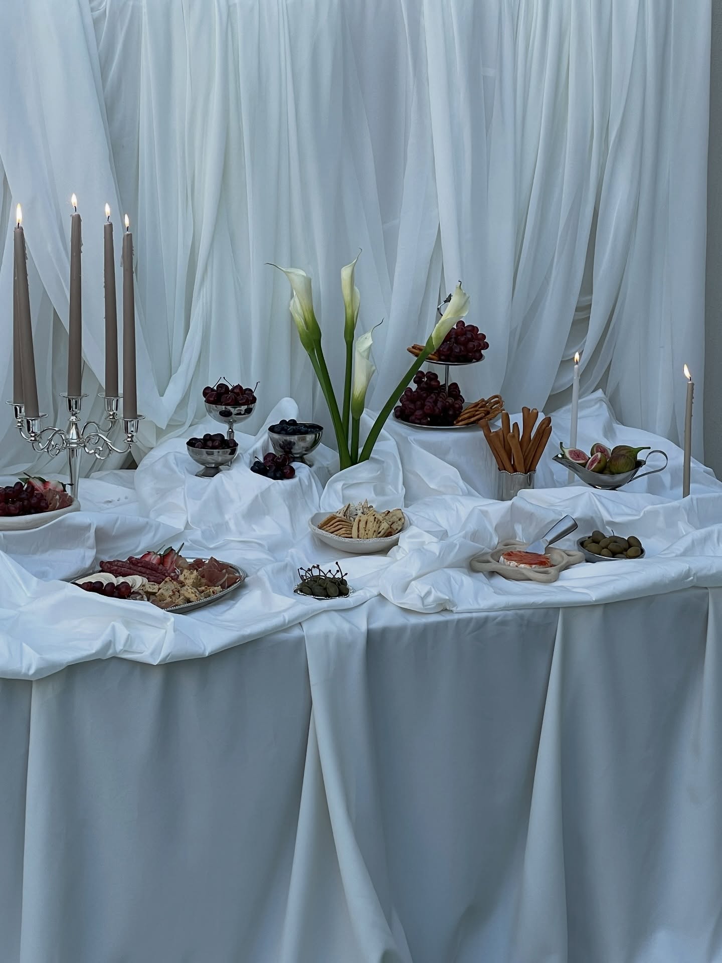 Not just a table. A composition.
In styling, it’s never about how much you add, it’s about how intentionally you place.
When designing a grazing table, think in layers:
•Start with fabric to soften the structure
•Create levels for depth and elegance
•Repeat colors for cohesion
•Leave negative space so each element can breathe
#eventstyling #grazingtable #dubaievents #eventstylist #stylingtip