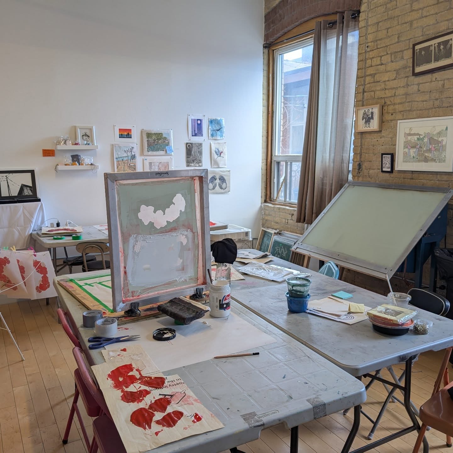 ONE SPOT LEFT in our Screen Print Intensive happening next Saturday!
Screen Print Intensive
With Amye St John
$75
Saturday, March 7, 2026 at 11am-4pm
58 Wade Ave, unit 8a, Toronto.
Register at link in bio or www.inprintcollective.com/join-a-workshop
Interested in screen but intimidated by the process? In this workshop, you'll receive an intensive introduction to emulsion-based silkscreen and demystify the practice so you can do it at home. Learn what you need to know about the basic set-up and supplies, coating and exposing screens, as well as pulling a basic one-layer print.
All supplies, including screens to use in class are provided. Students can bring their own drawings ready to expose, or use provided templates to just get the hang of the process. Drawings should not have an image size bigger than 7" x 10" and should be black and white only, no tones or shadows. Please keep images PG-13.
Perfect for beginners or printmakers who need a refresher. Suitable for older teens and adults.
ID- A view of the studio, with a screen print in progress. A screen is sitting upright on a table, covered in ink.