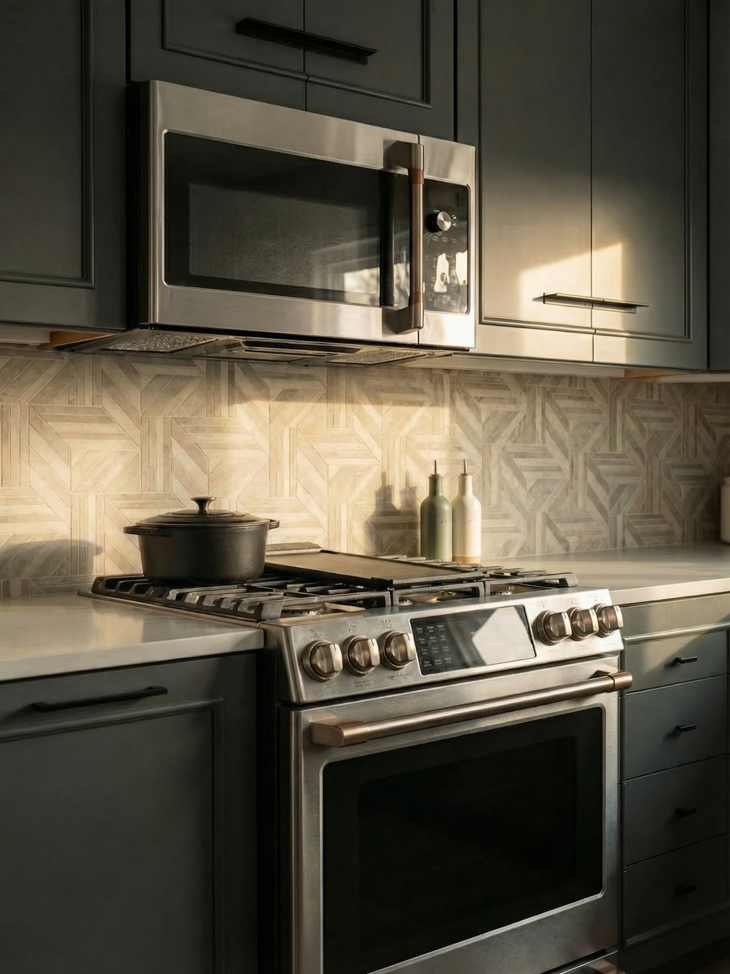 We spent a lot of time on the details in this kitchen. The cabinet profile was custom designed by us and the backsplash was imported from Spain. The texture and pattern catch the light in a way you just can’t replicate with standard tile. That’s how we approach every project, with thoughtful design, quality materials, and details most people don’t even realize are there.
If you’re going to invest in your home, do it once and do it right. We’d love to build something like this for you. Hit us up!