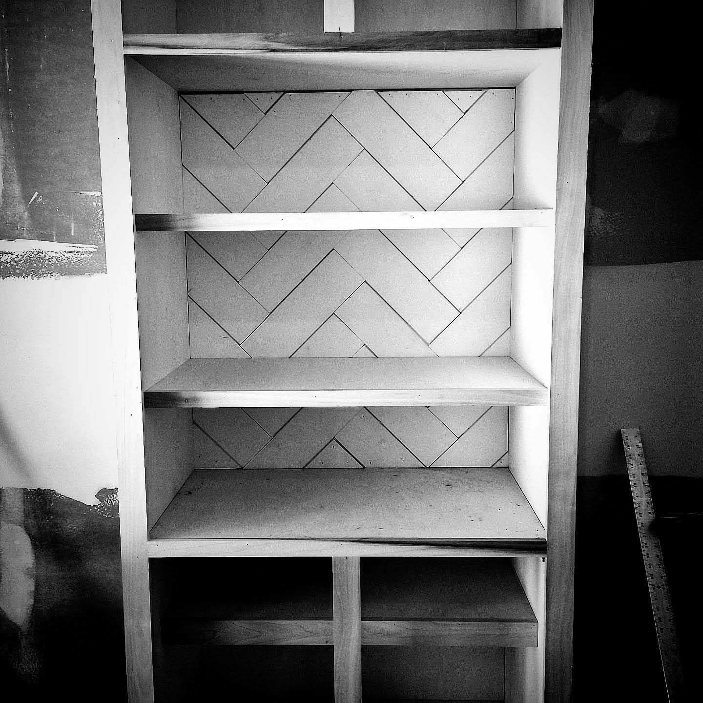 Sometimes, a design doesn't make the final product, as the clients decided on a simpler design for the back of the built-ins. But, we will definitely be creating from this design language on future projects. Adding herringbone in spaces you wouldn't normally see it has such great potential. 👍